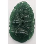 A Chinese green jade carving of flowers and fruit, L.5.5cm