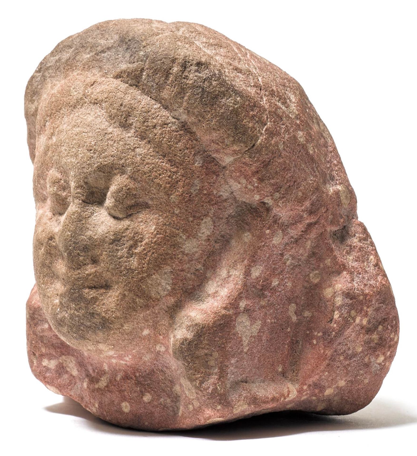 A SMALL MOTTLED RED SANDSTONE HEAD. - Image 2 of 5