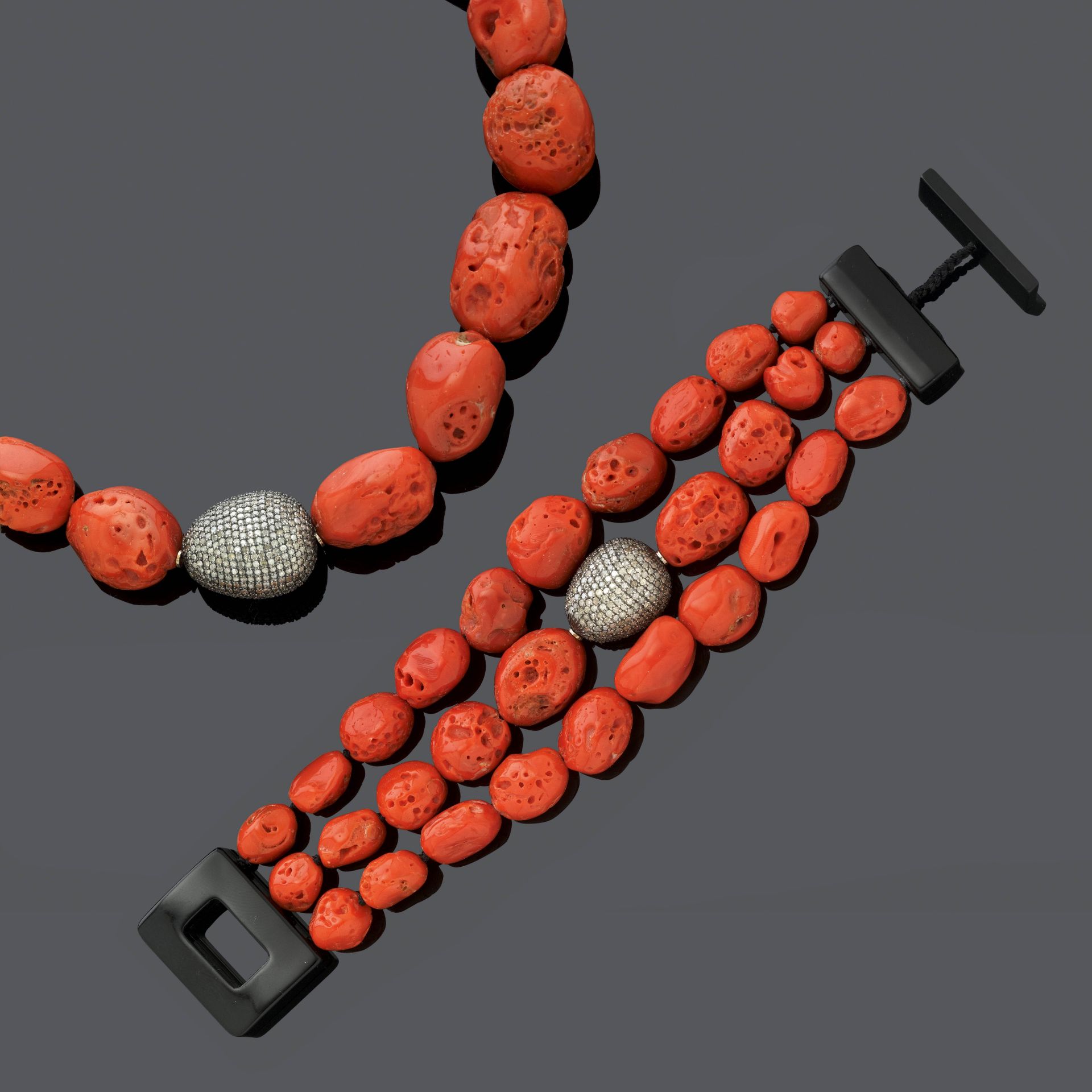 CORAL, DIAMOND AND BAKELITE NECKLACE WITH BRACELET, BY EVA NUEVA.