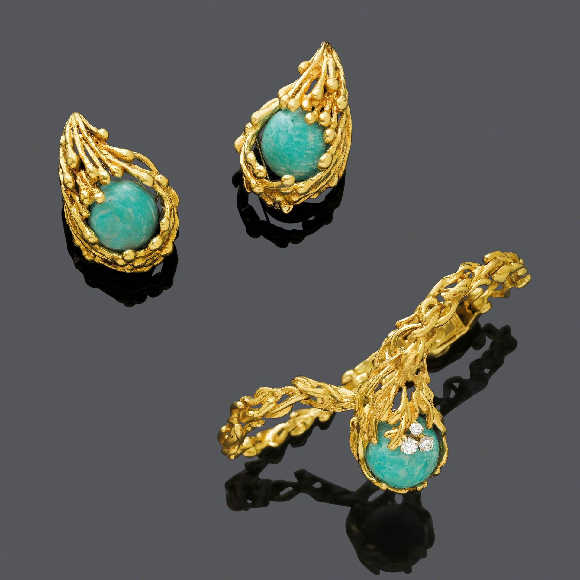 MULTIGEM AND GOLD BRACELET WITH EARCLIPS, BY GILBERT ALBERT.