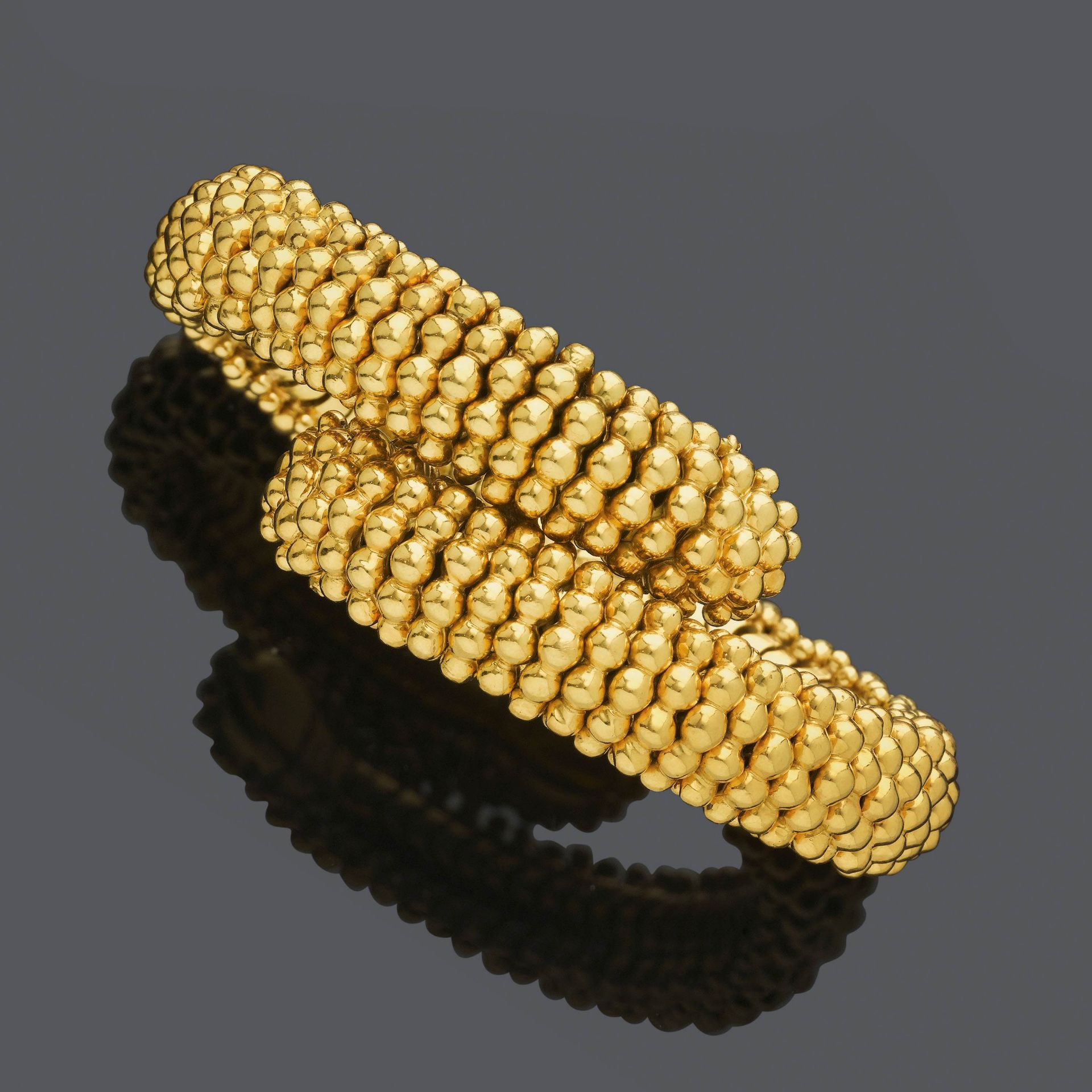 GOLD BRACELET, BY SABBADINI.