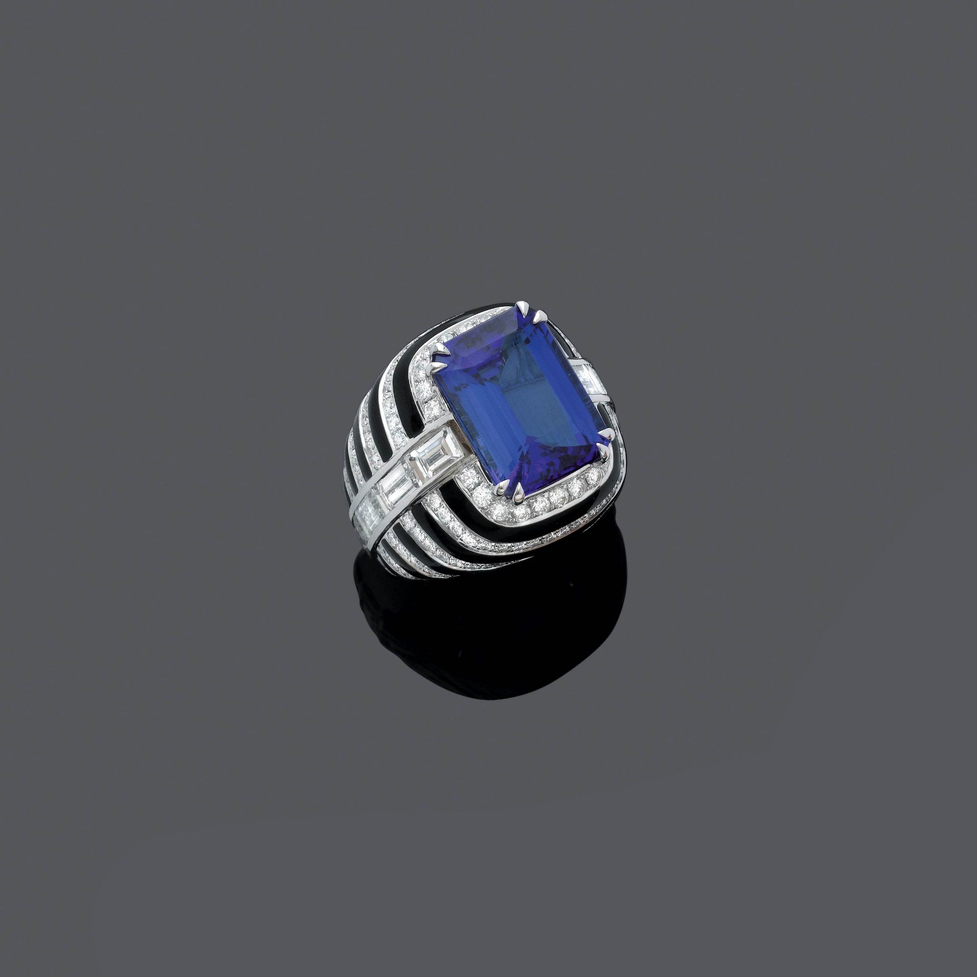 TANZANITE, ENAMEL AND DIAMOND RING.