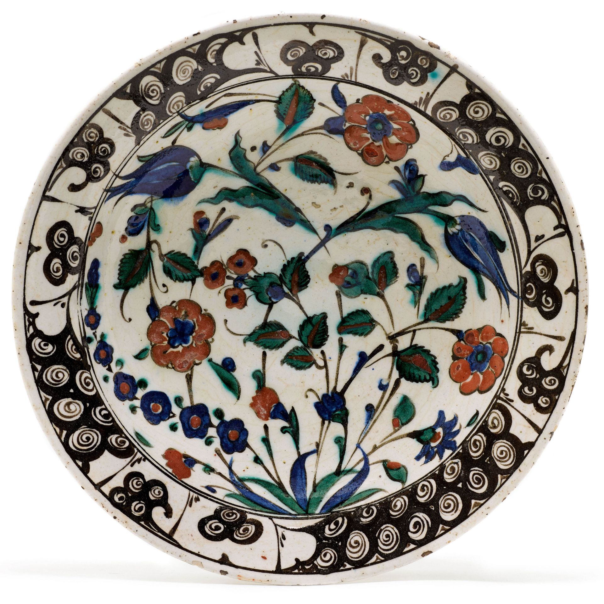 AN IZNIK CERAMIC PLATE