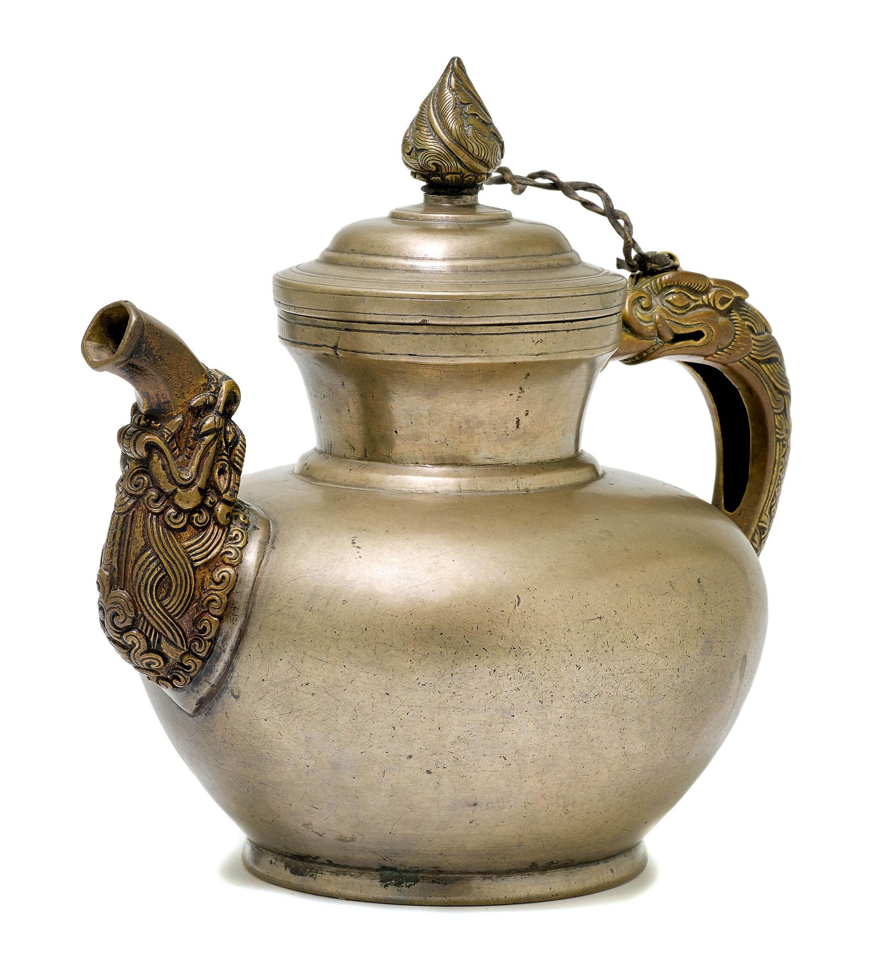 A PLAIN BRONZE TEAPOT.