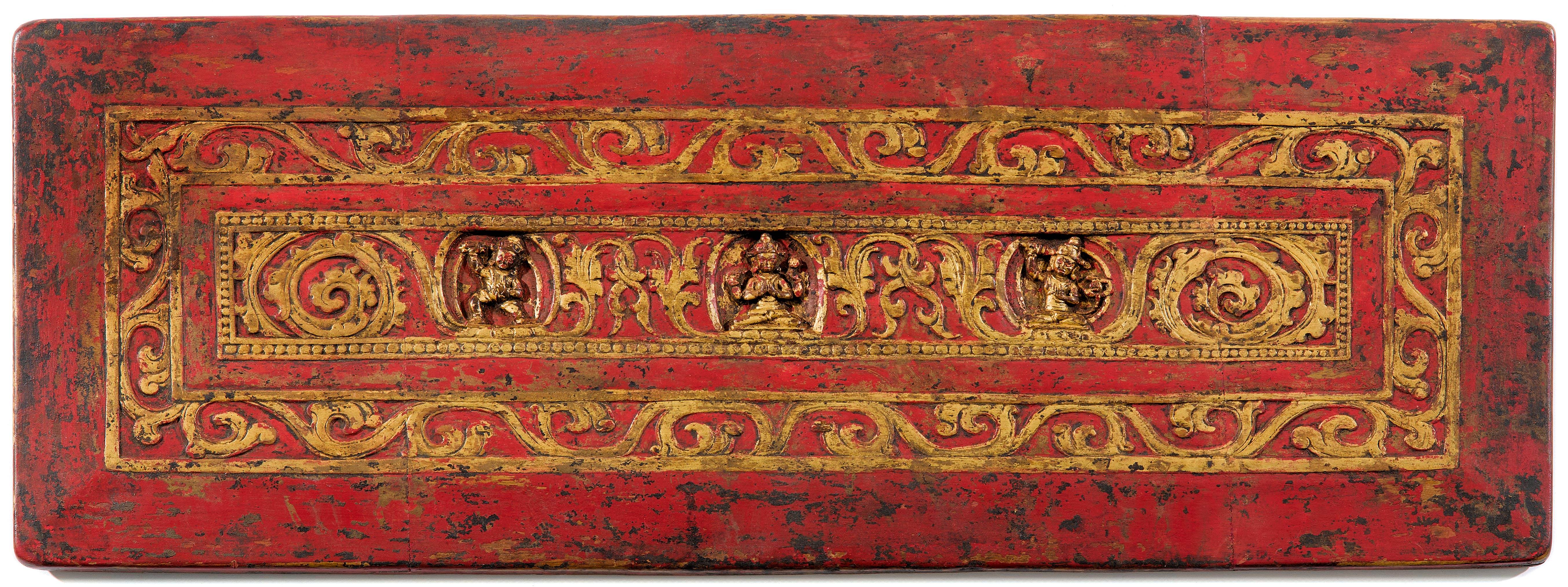 A RED AND GOLD PAINTED MANUSCRIPT COVER.