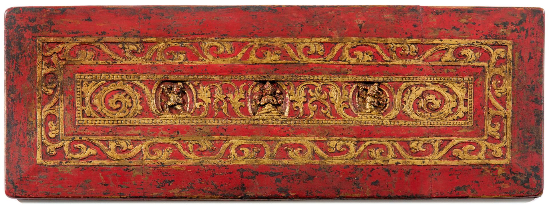 A RED AND GOLD PAINTED MANUSCRIPT COVER.