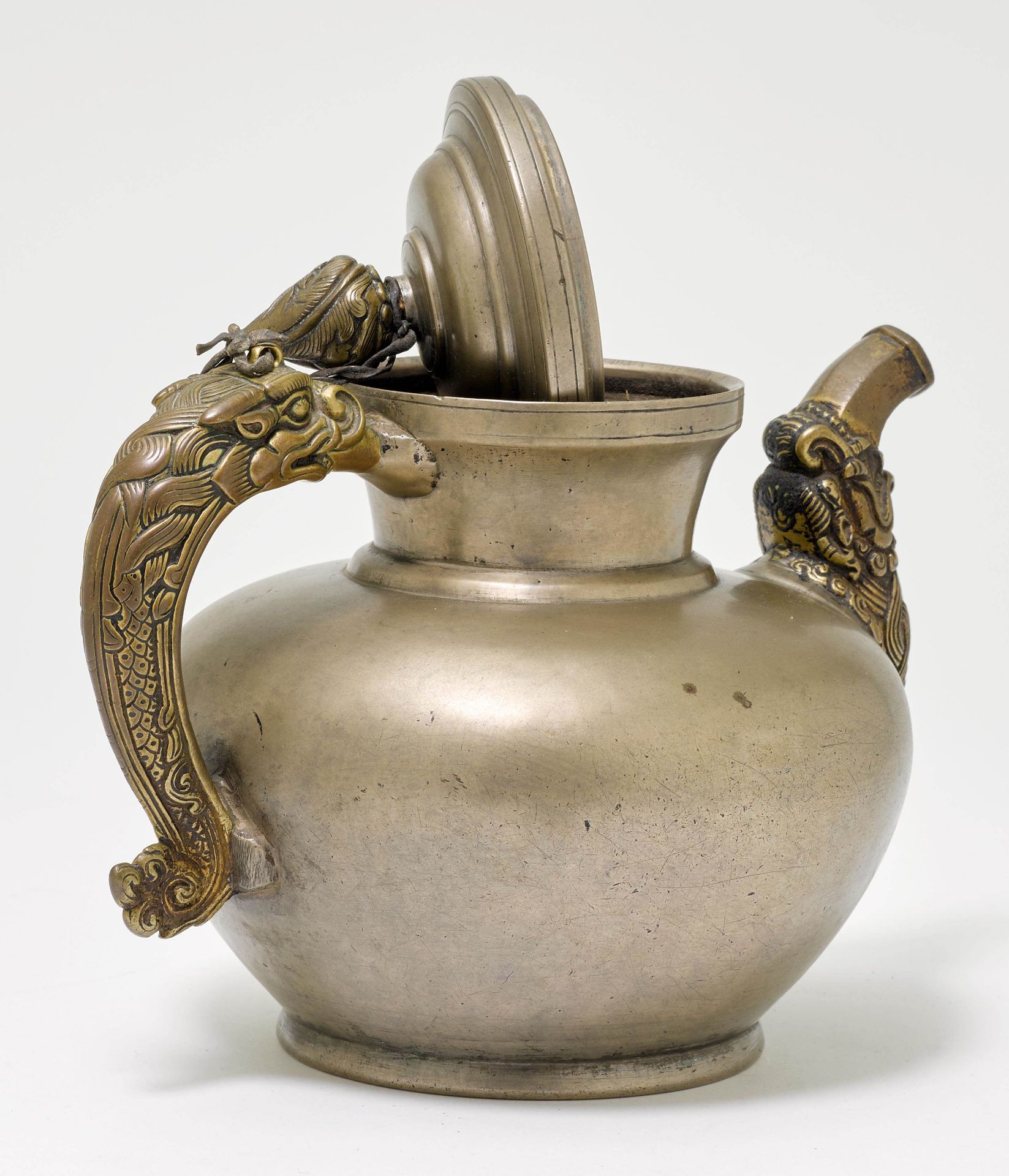 A PLAIN BRONZE TEAPOT. - Image 2 of 2