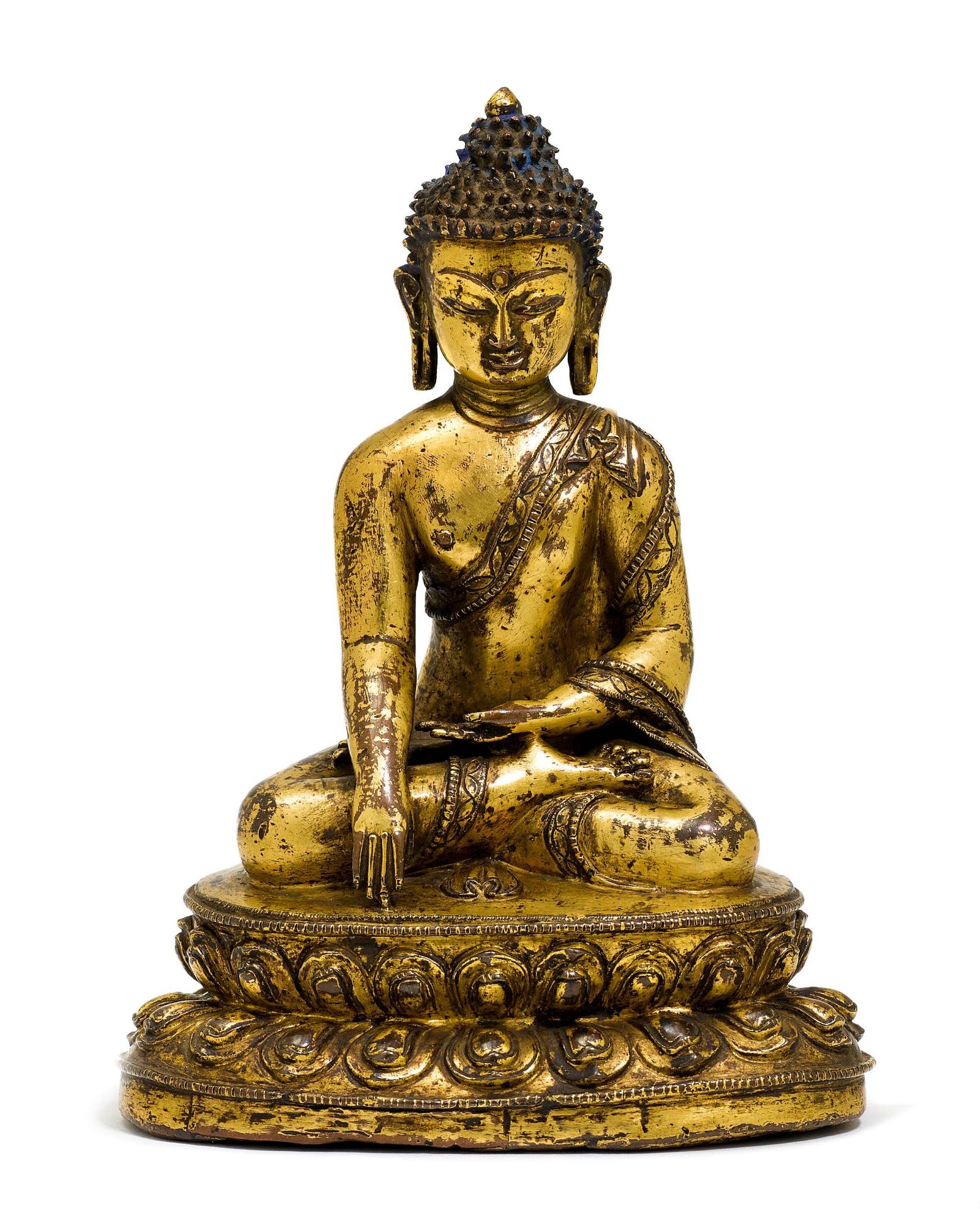 A GILT COPPER ALLOY FIGURE OF BUDDHA SHAKYAMUNI.