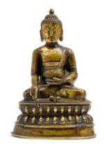 A BRONZE FIGURE OF SHAKYAMUNI WITH A VAJRA ON THE LOTUS THRONE.