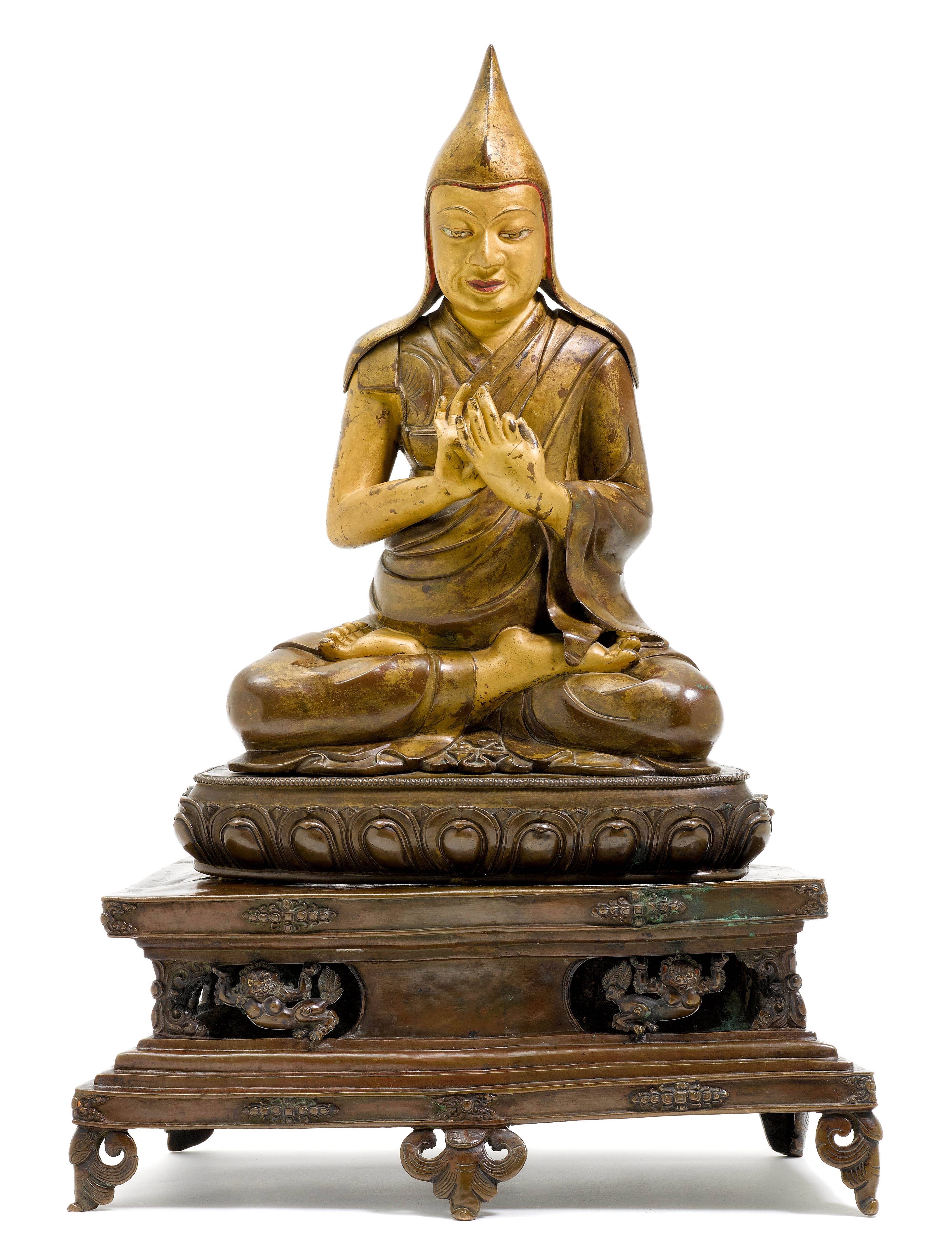 A LARGE COPPER ALLOY FIGURE OF TSONGKHAPA.