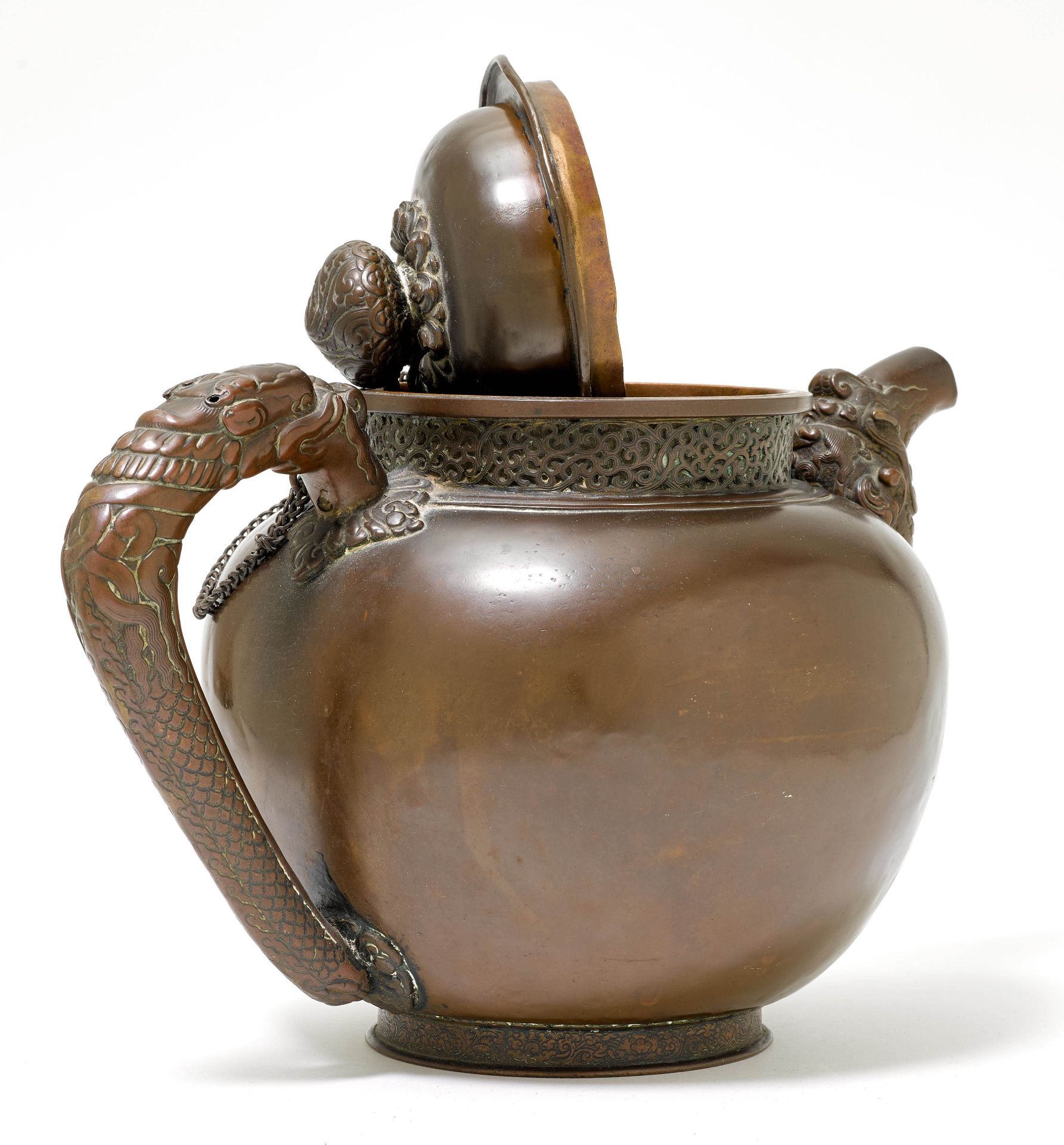 AN EMBOSSED COPPER TEAPOT. - Image 2 of 2