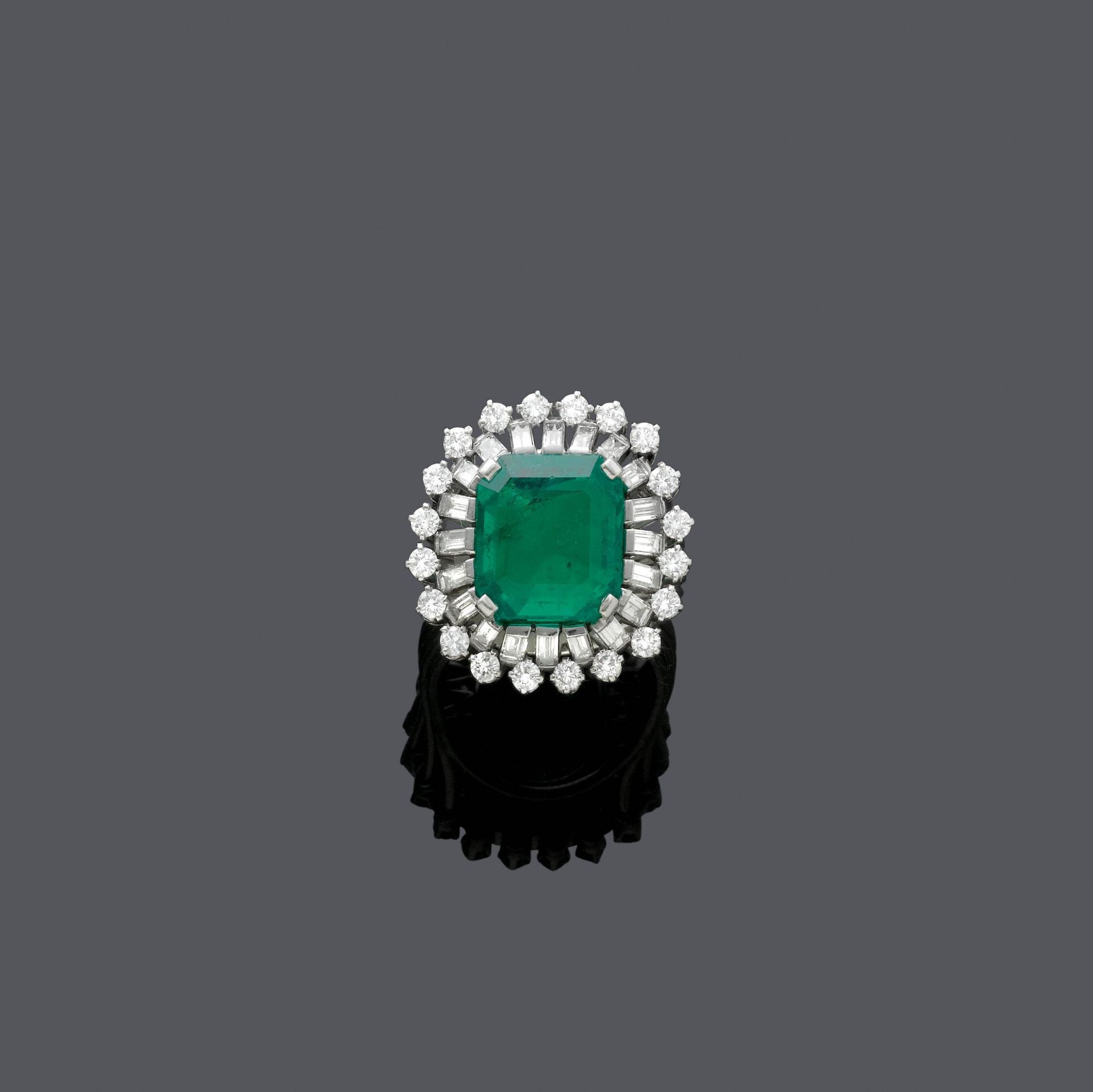 MUZO EMERALD AND DIAMOND RING, ca. 1960.