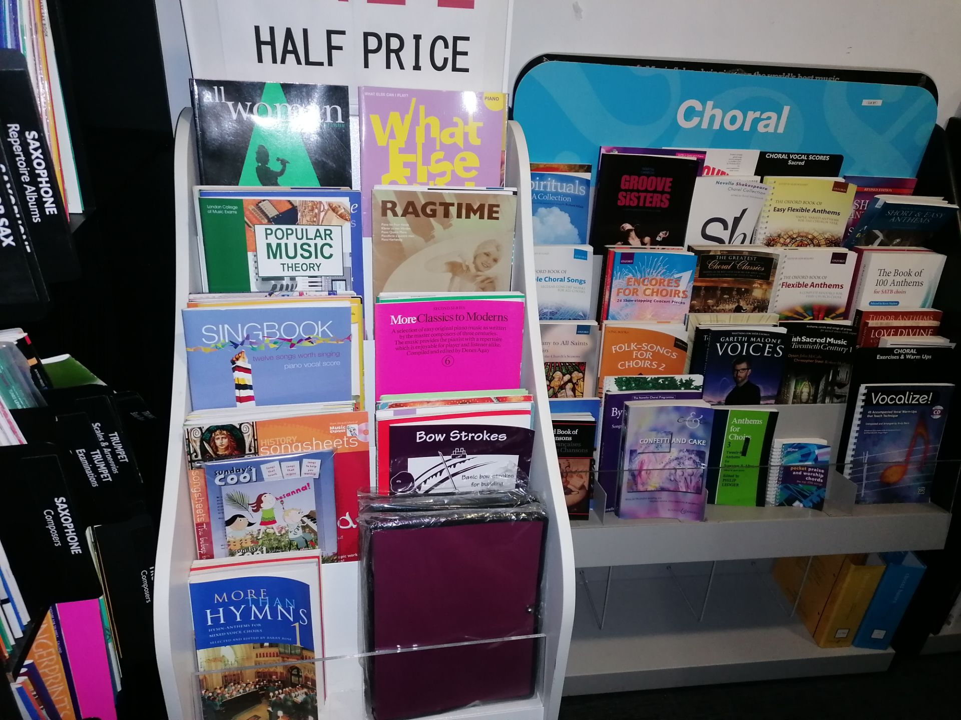 Various Choral Books & Browser with A Mixture of Music Books & White Stand