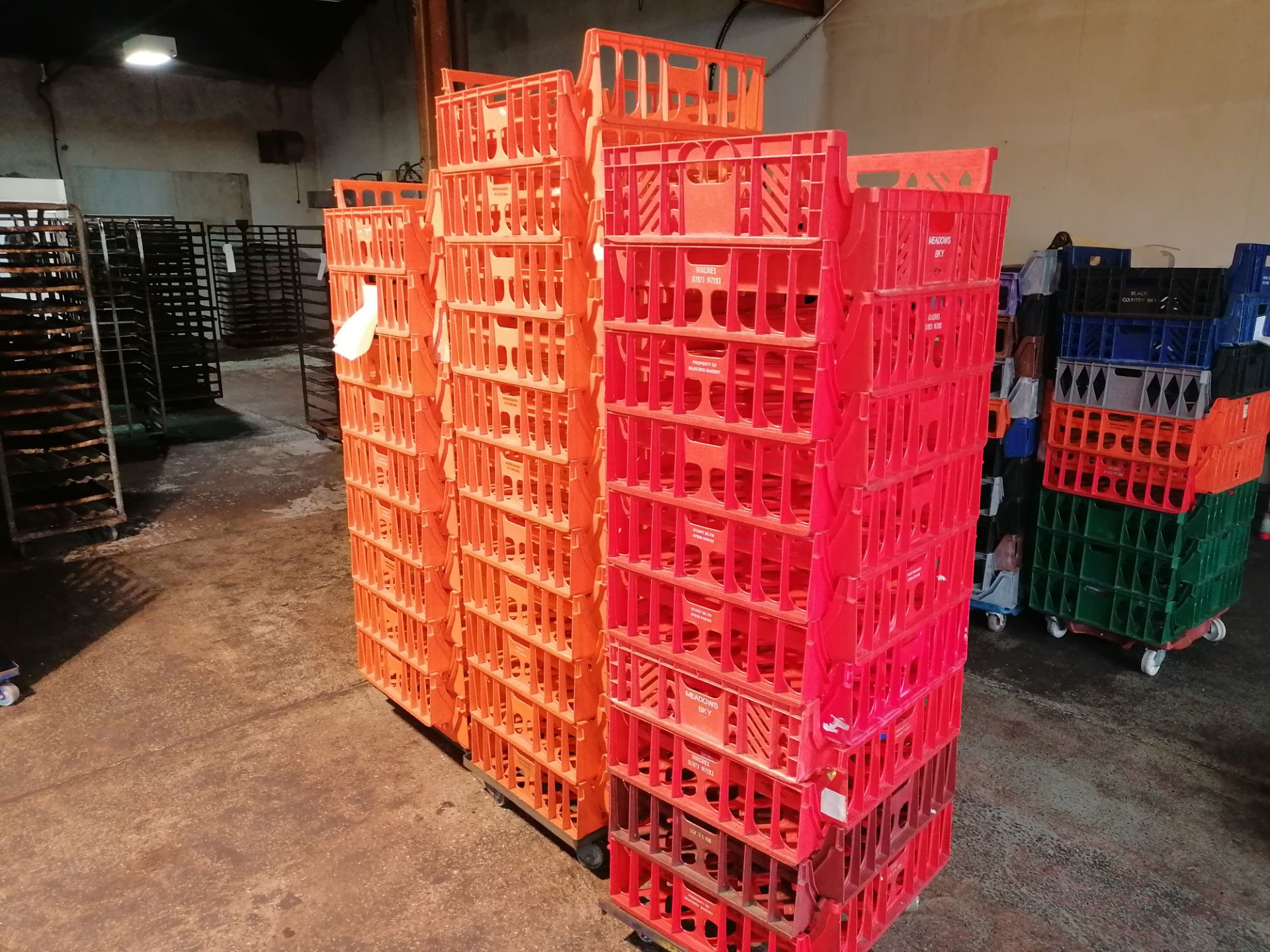 Large Anount Of Plastic Bread Trays Mainly Orange