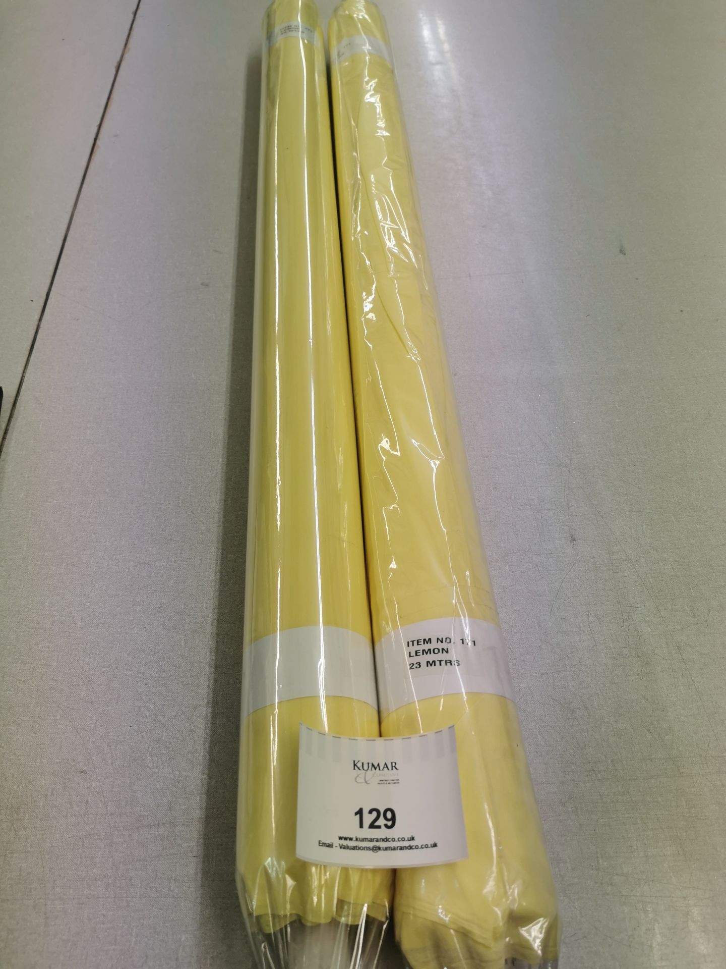 2 x New lemon coloured fabric rolls . Item No 171 . Estimated 50 linear meters