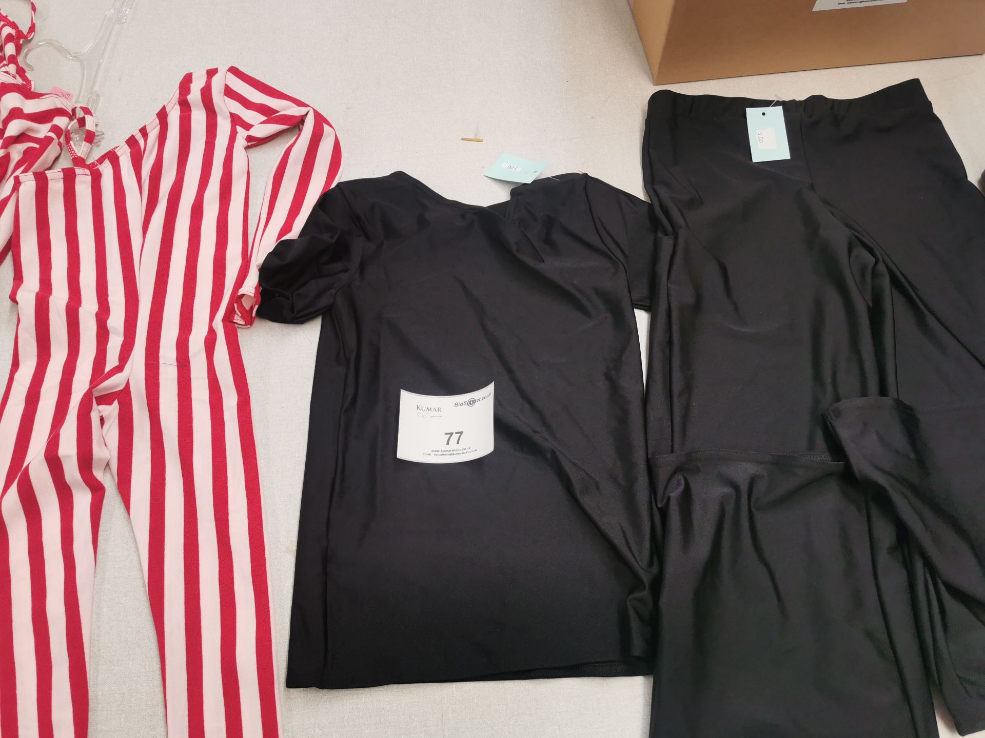 19pc Red and white jump suits (8) and black tshirts-trousers (11)