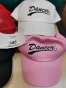 80+ Estimated dancer baseball caps in various colours.