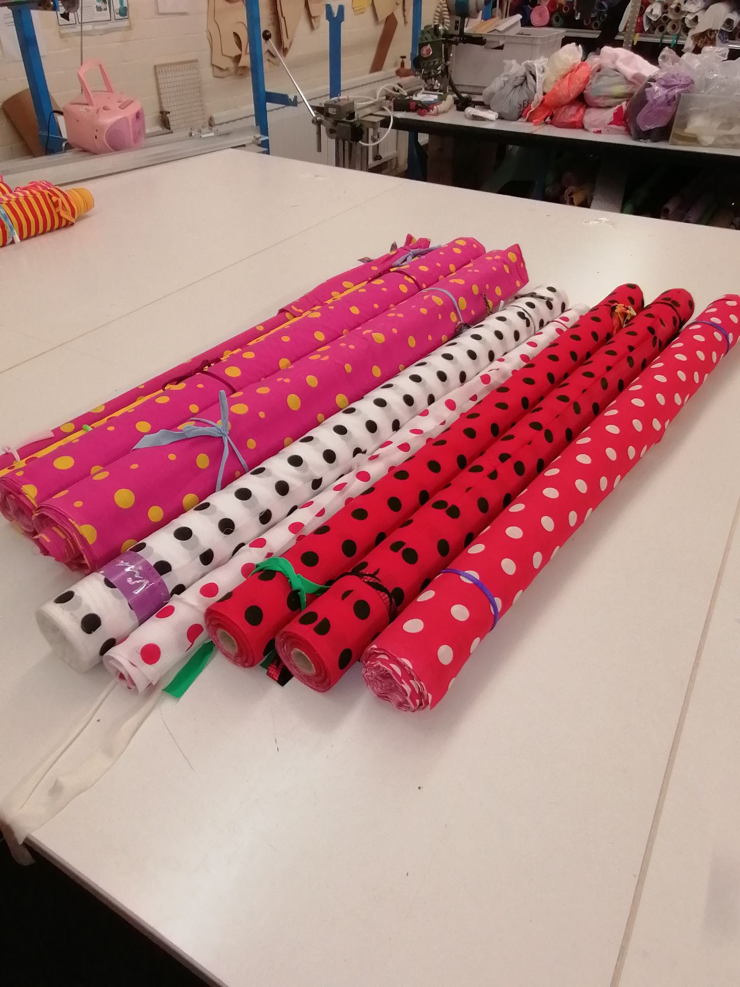 9 x Rolls of polka dot printed fabric . Estimated 100+ linear meters RRP £18-20 per meter