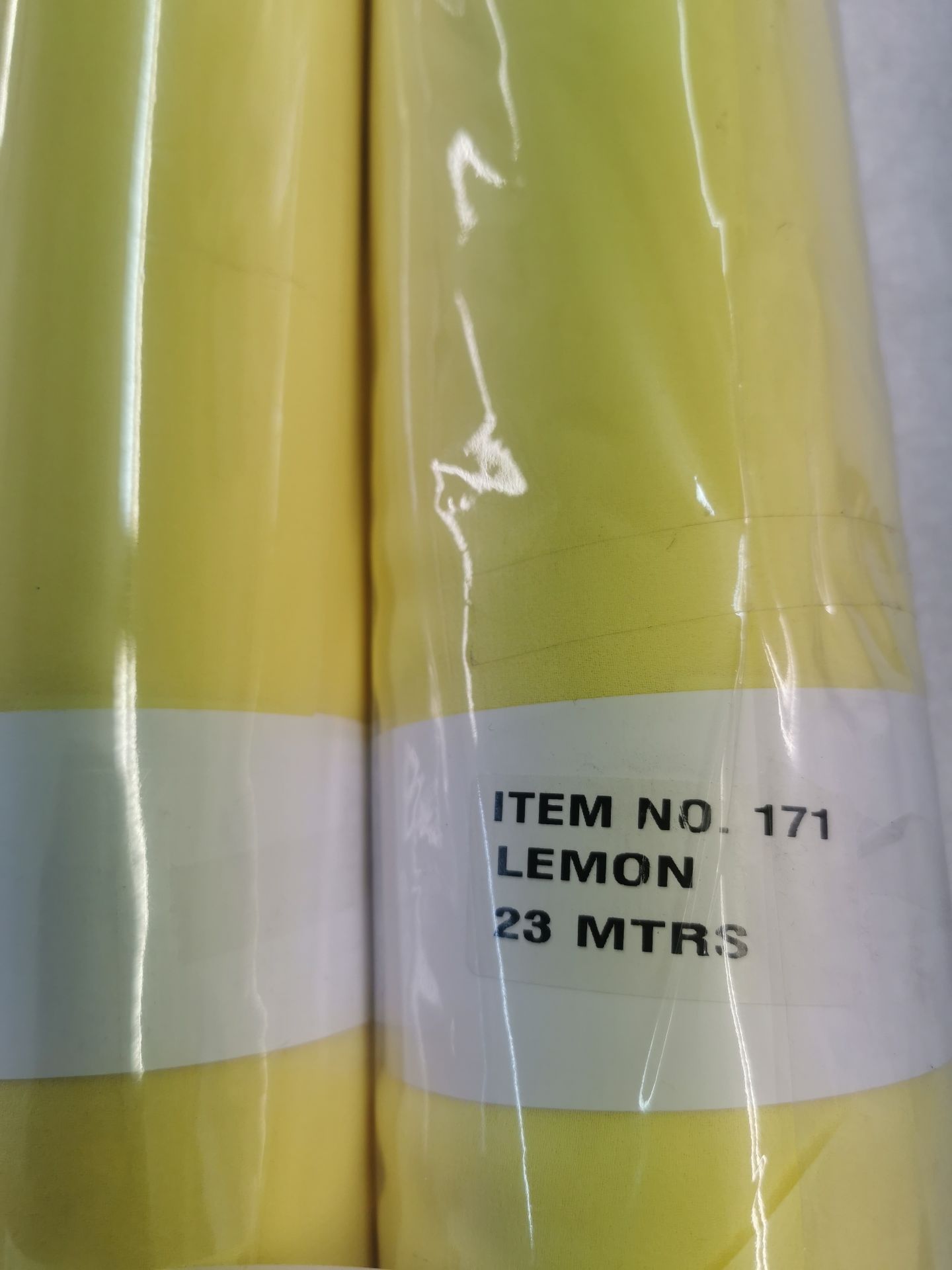 2 x New lemon coloured fabric rolls . Item No 171 . Estimated 50 linear meters - Image 2 of 3