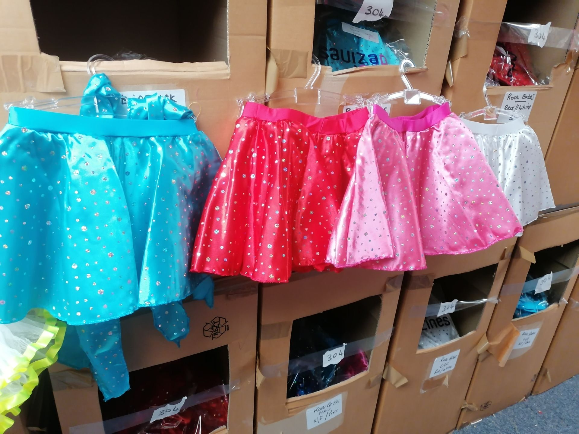 150+ Estimated skirts and sash in sizes-small-medium-large 6x boxes