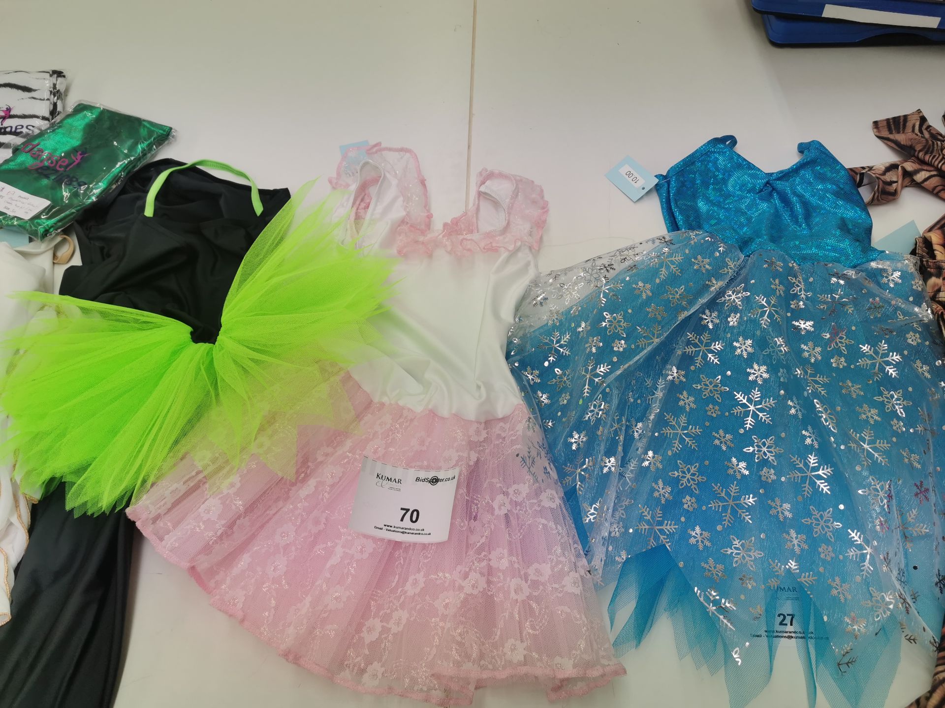 24pc Childrens Catsuits and dresses . Various designs and sizes