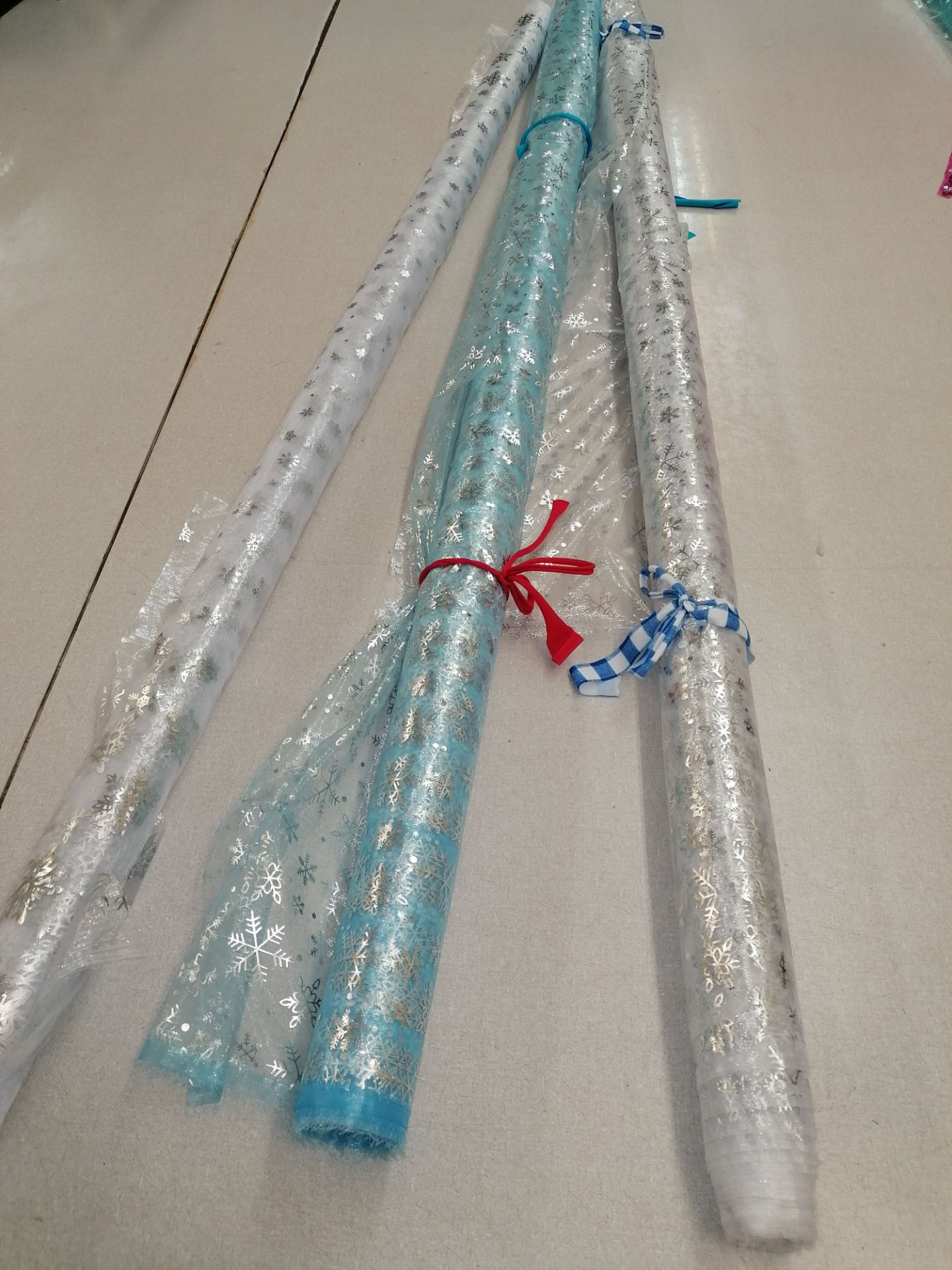 3 x Rolls Festive organza fabric. Estimated 30m