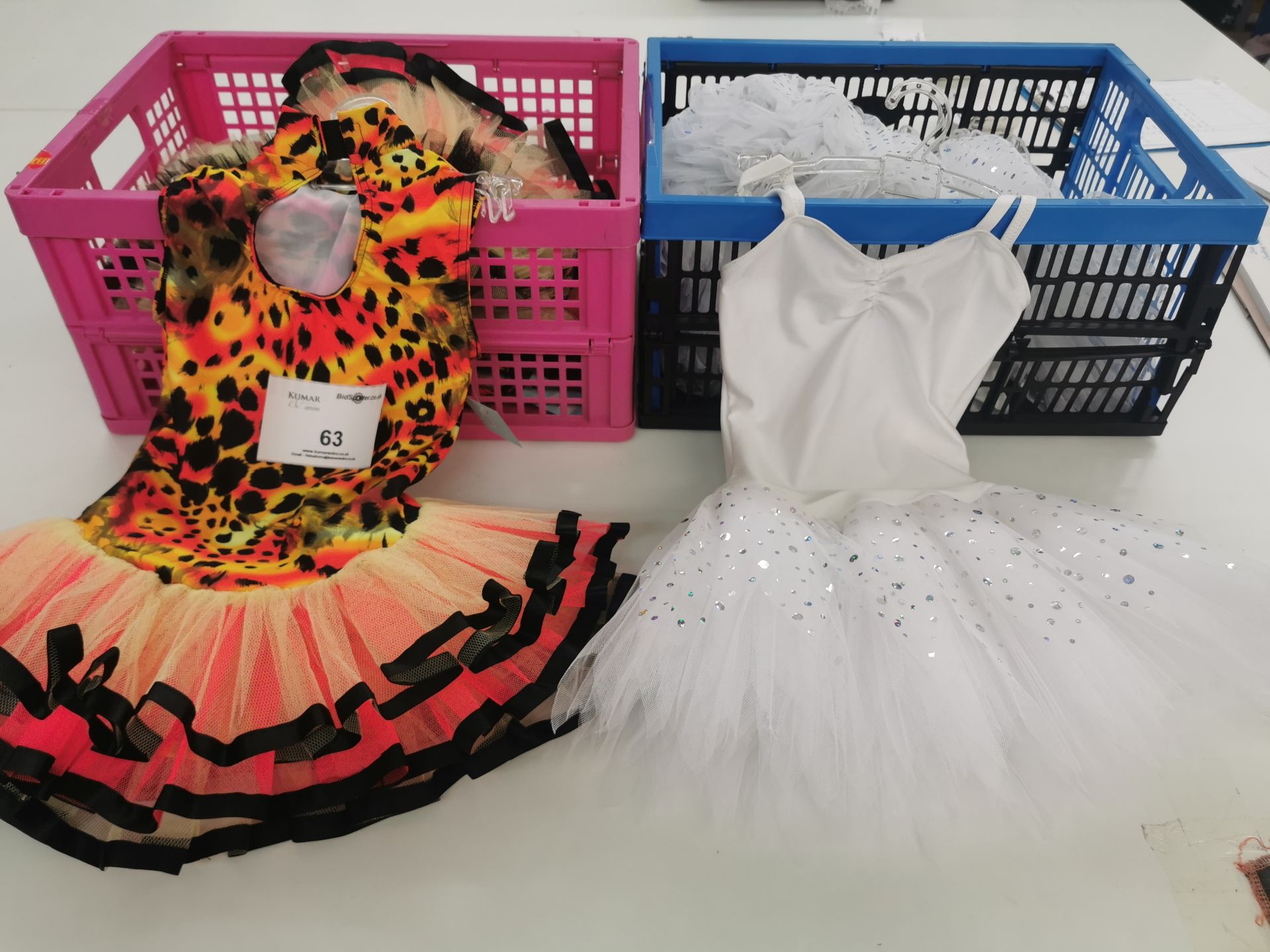 9pc Tutu dresses including white sequin and cheetah. Various sizes