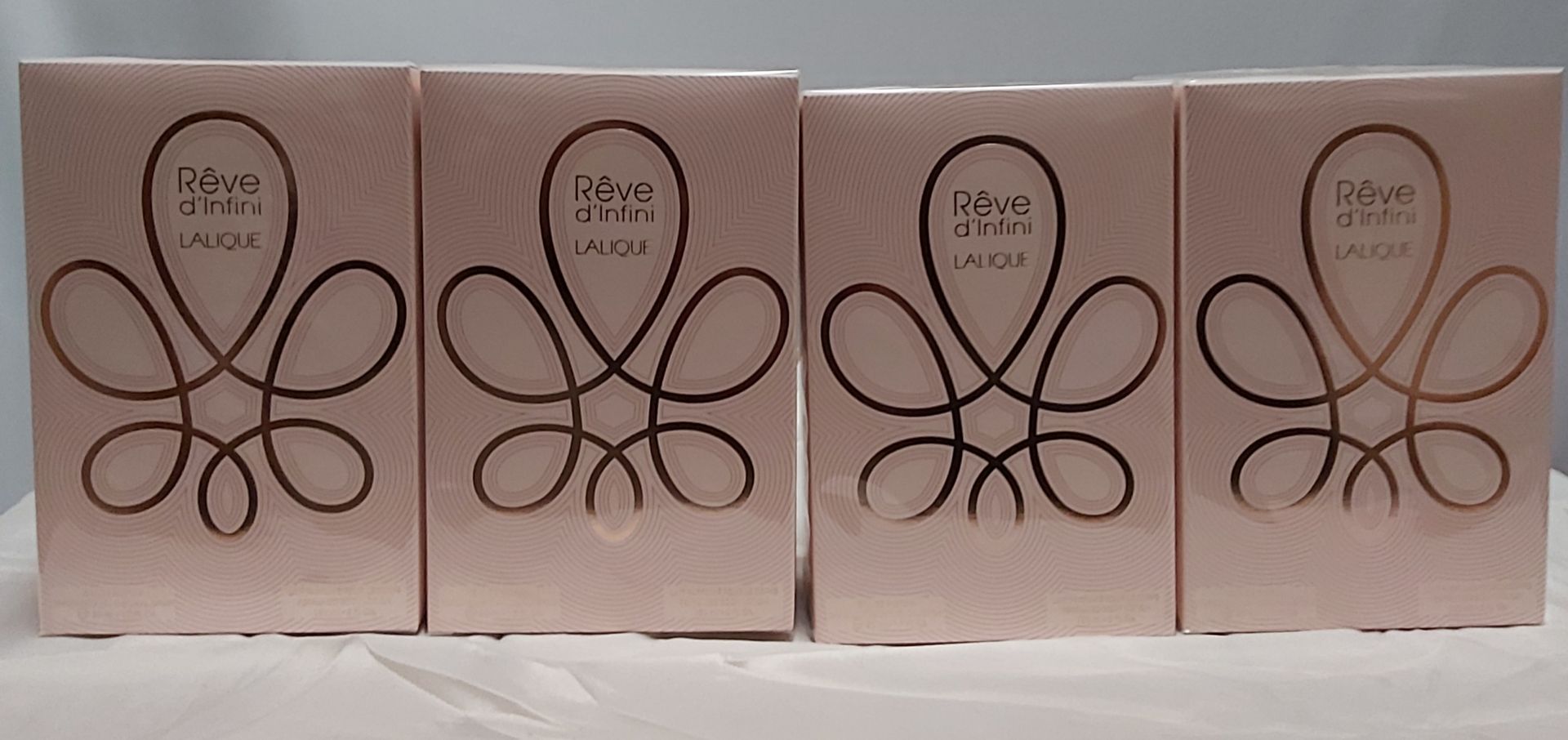 4 x Lalique Womens Reve D'Infini. 50ml EDP & 150ml Body Lotion. Condition New & Sealed. (RRP £288)