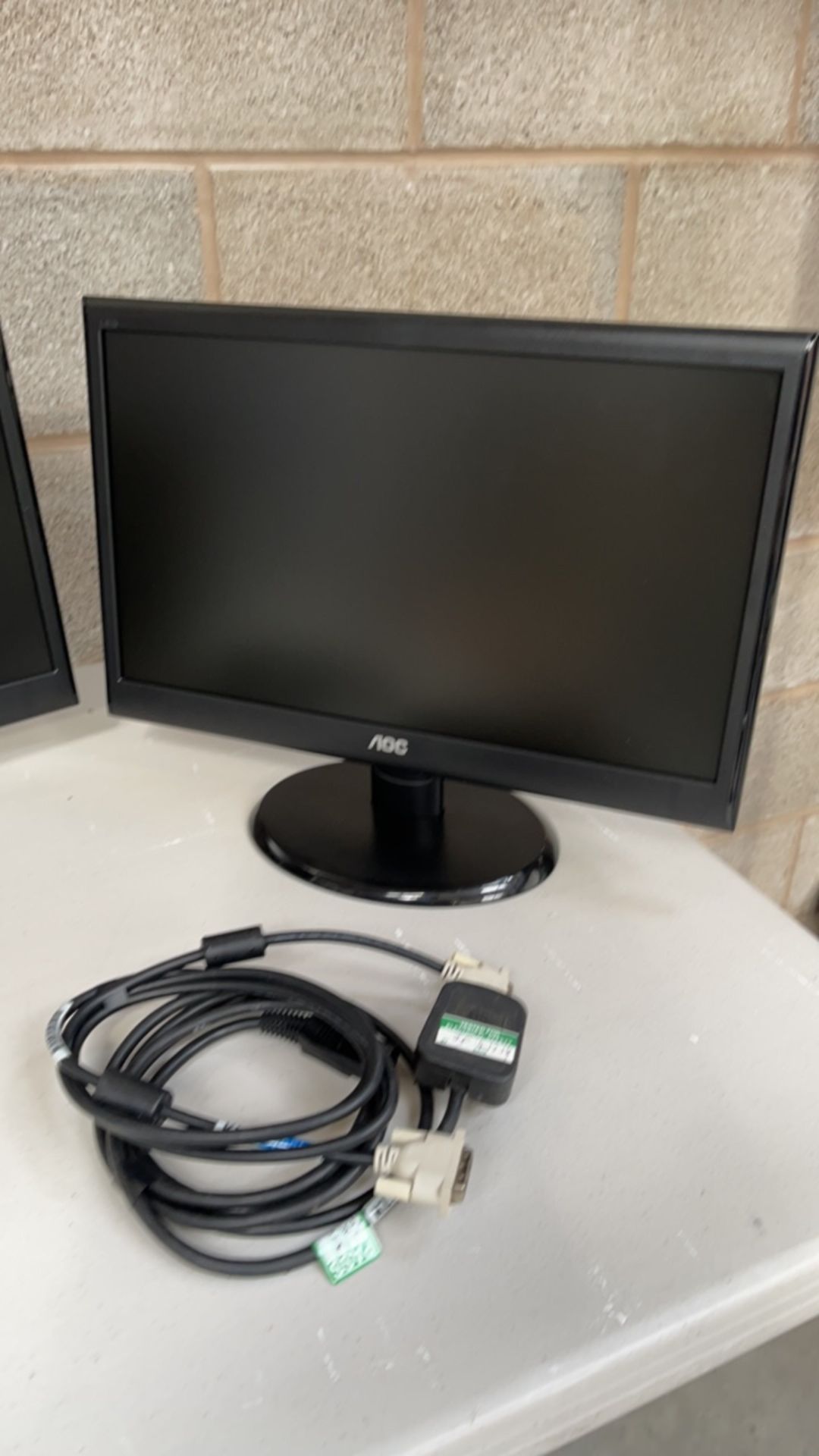 2 x AOC 18.5 monitor, model number 185lm00013. One has 2 small scratches on screen. Complete with - Image 3 of 6