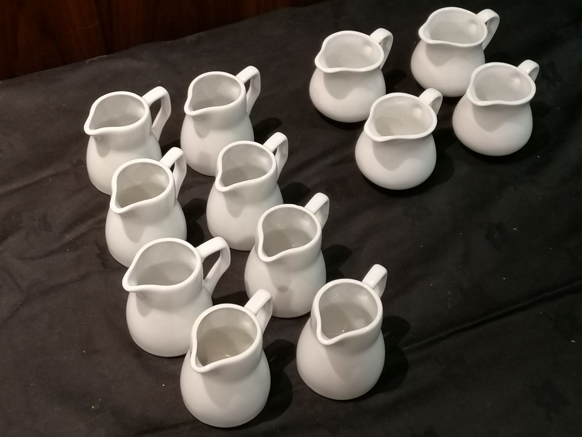 8 x Porcelite jugs 4 x Athena jugs