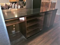Fixed serving area with black granite top measurin