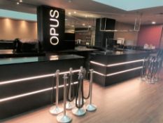 Opus bar area with black granite tops, glass shelv