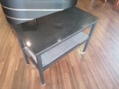 Hostess trolley with black granite top on casters