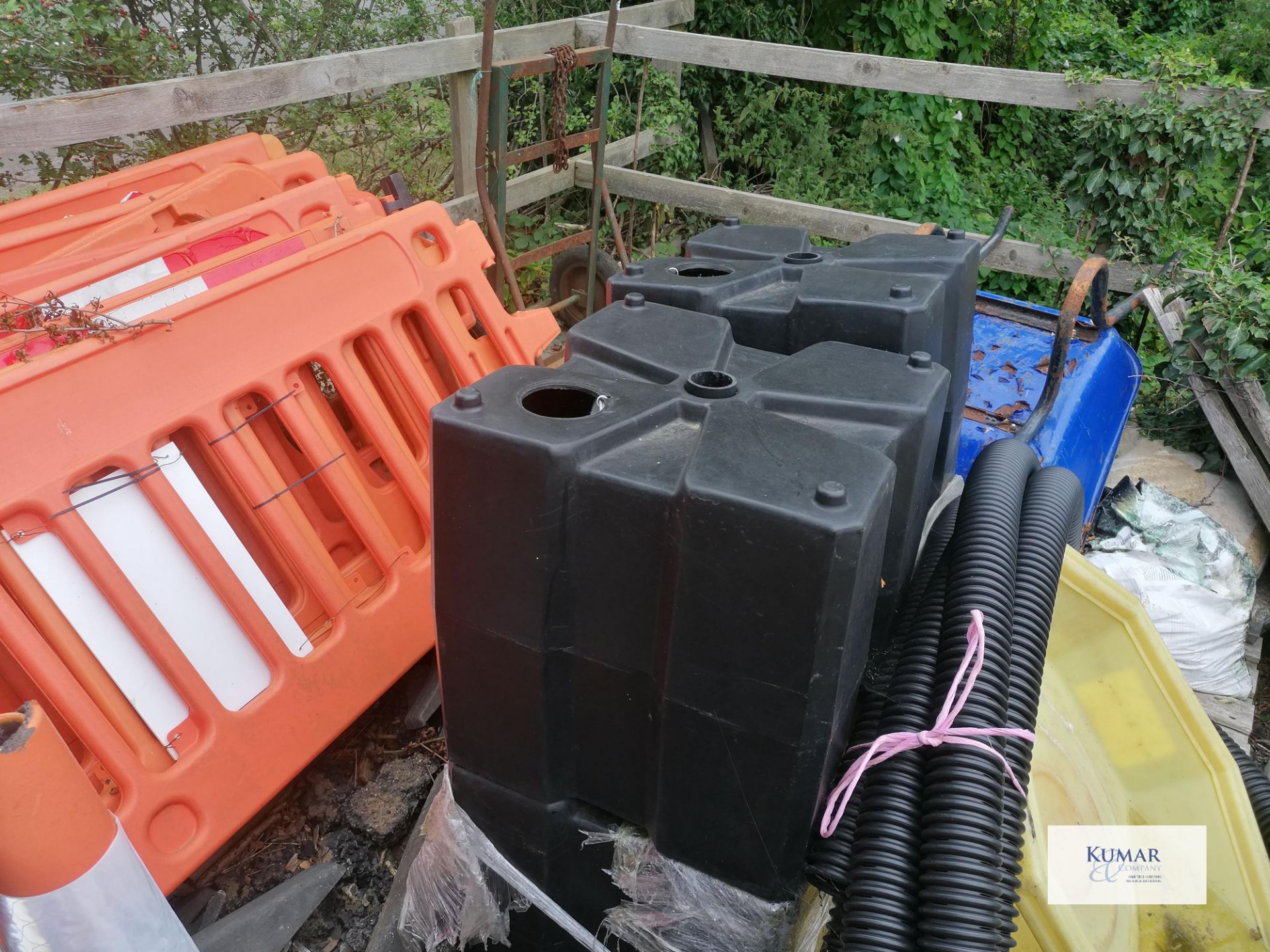 Contents of outside storage area including scafold pipes , tiles , plastic bariers , water butt as - Image 10 of 10