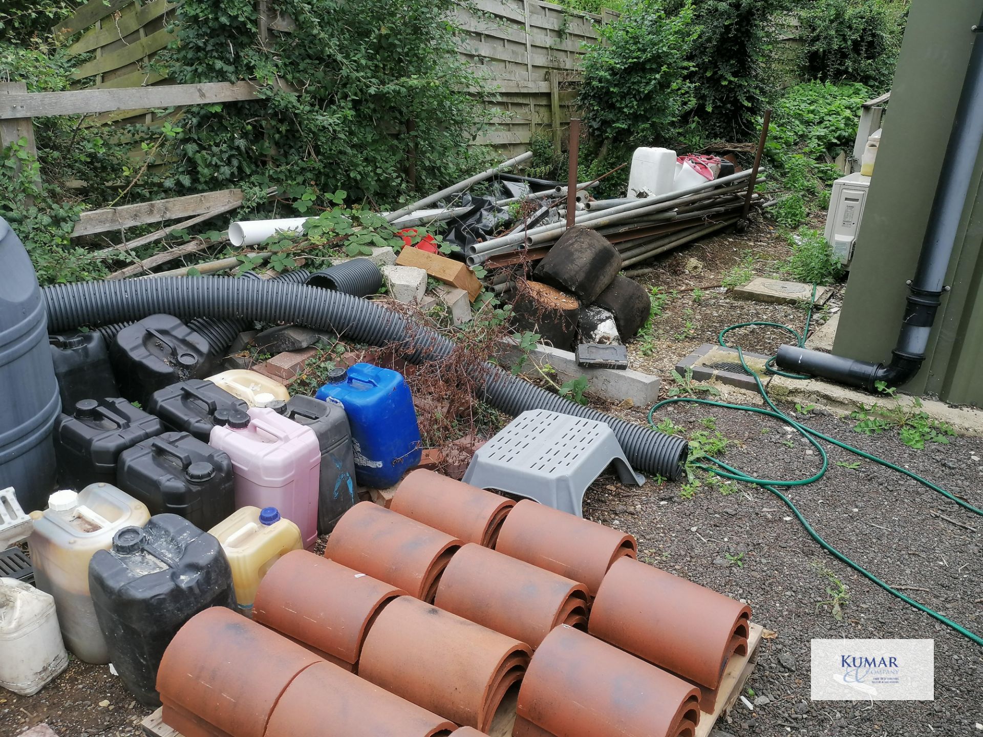 Contents of outside storage area including scafold pipes , tiles , plastic bariers , water butt as - Image 3 of 10