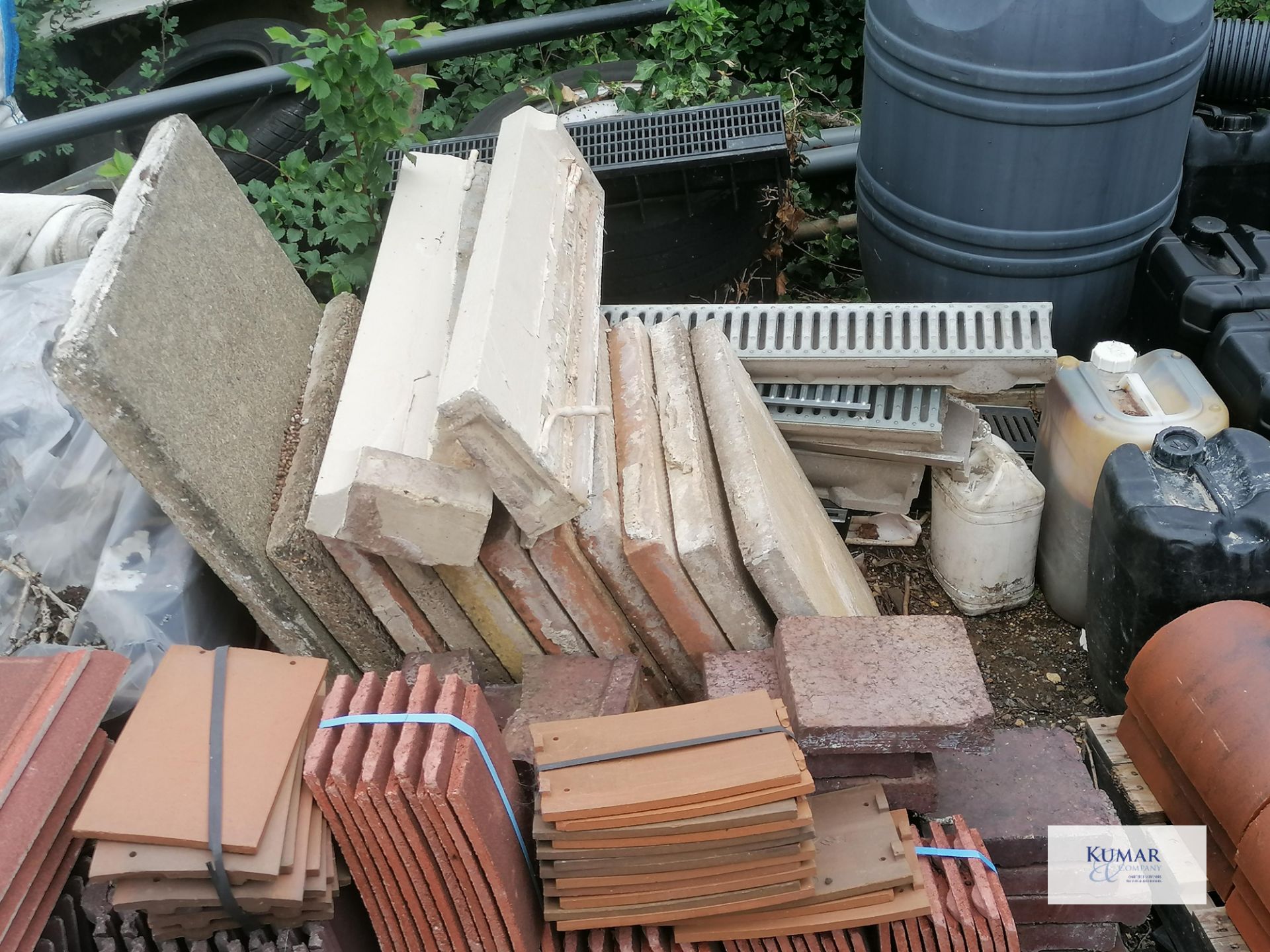 Contents of outside storage area including scafold pipes , tiles , plastic bariers , water butt as - Image 7 of 10