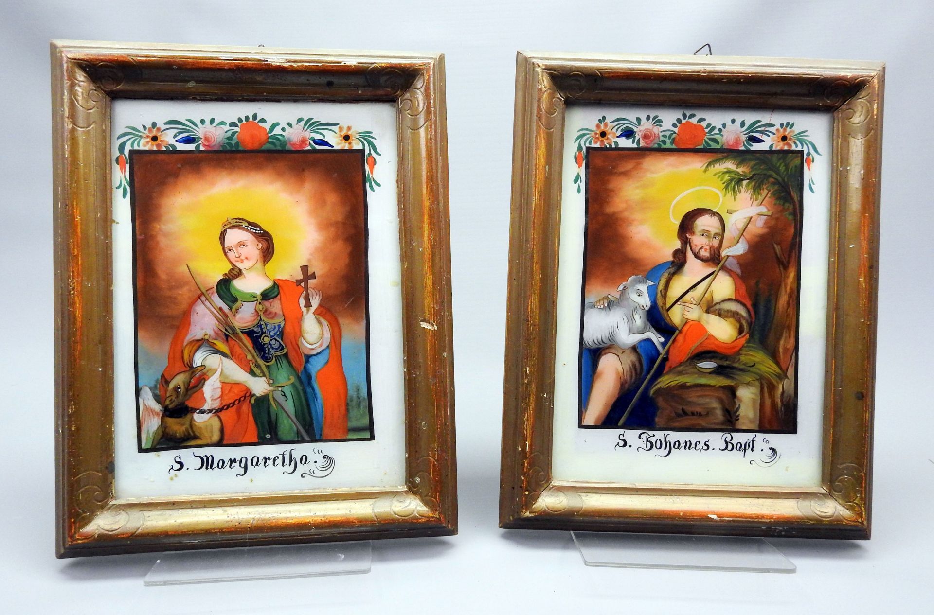 Paar Hinterglas-Darstellungen Hinterglasmalerei. Im Rechteck dargestellter Hl. Johanne