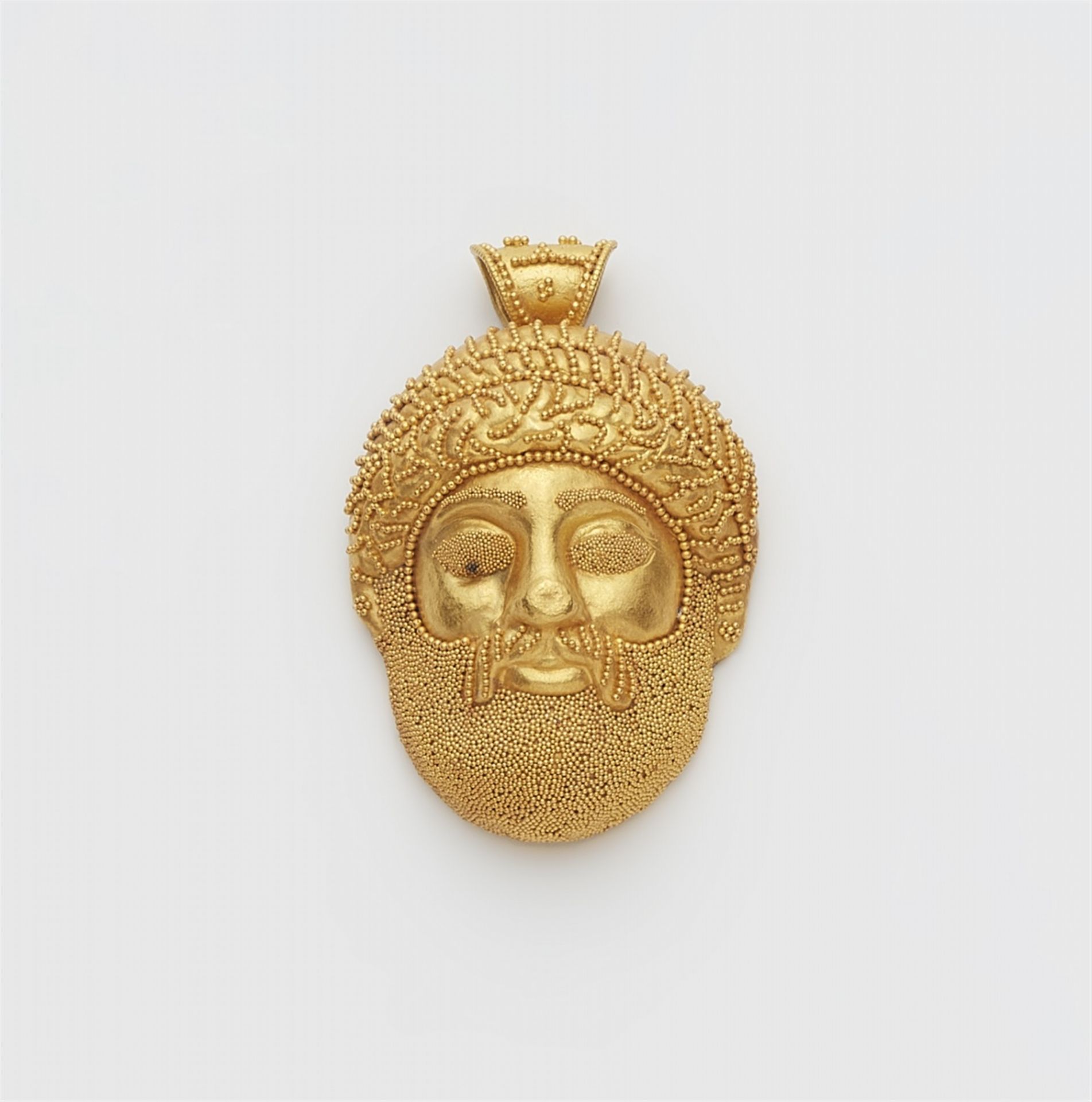 A gold granulation pendant