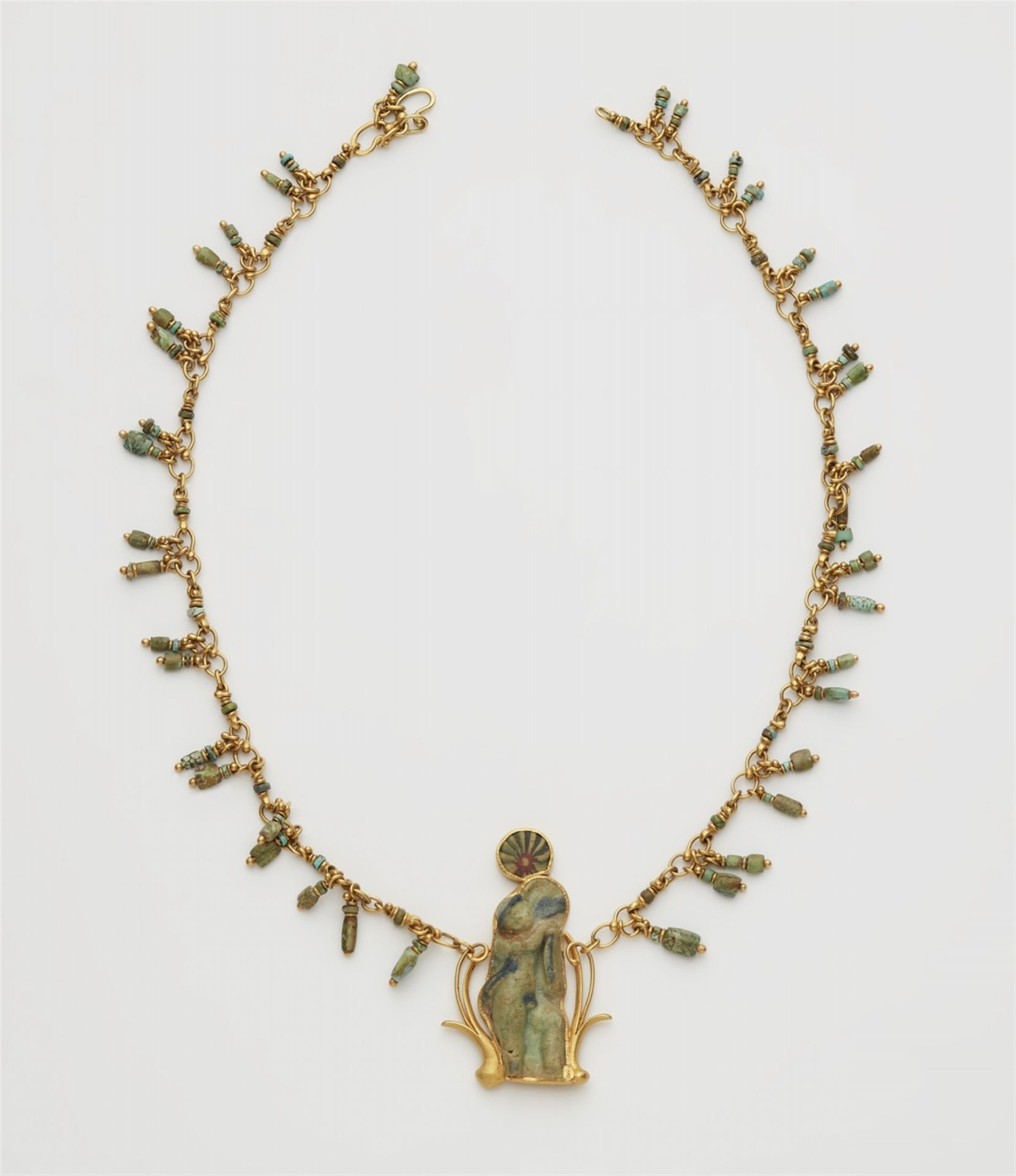 A 22k gold necklace with an ancient Roman relief fragment