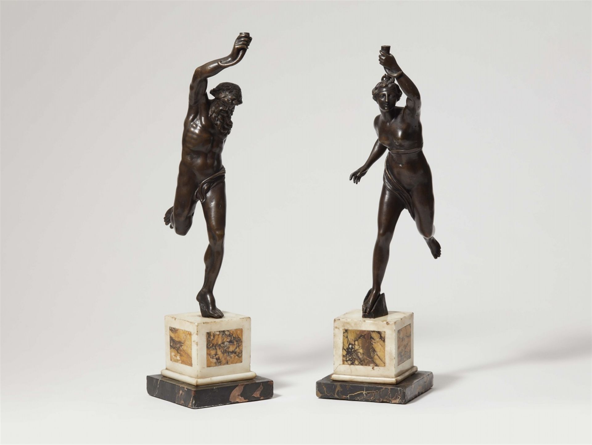 A bronze model of a satyr and a nymph