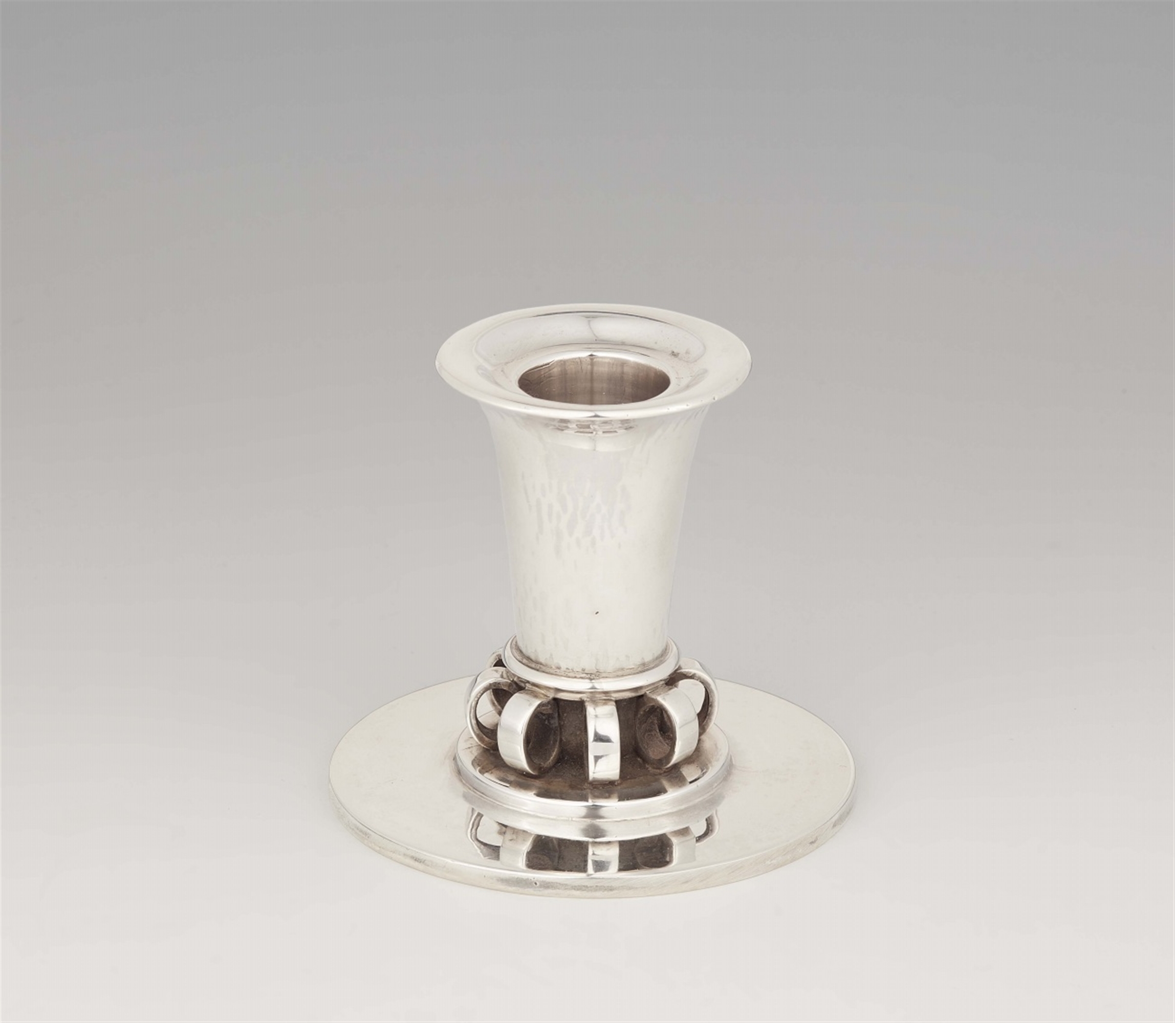 A Copenhagen silver candlestick by Georg Jensen, model no. 539