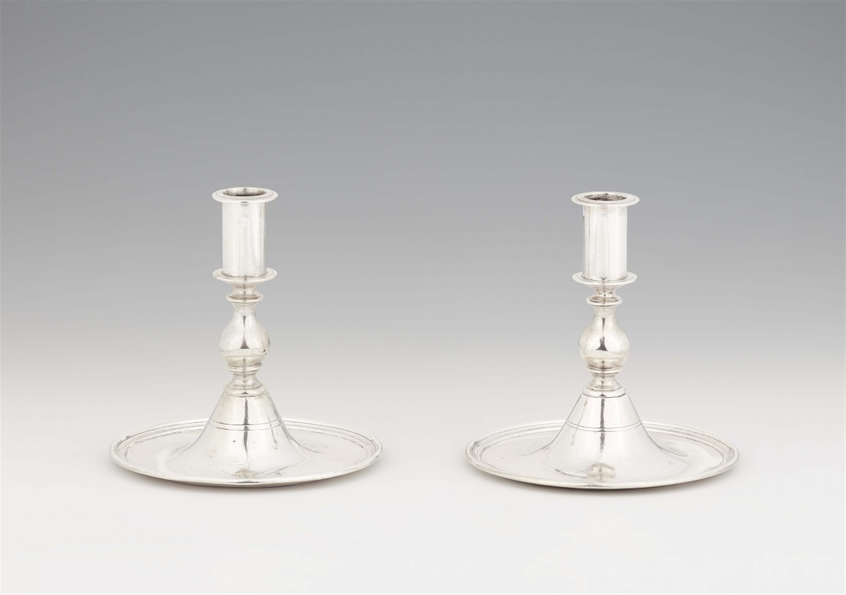 A pair of Spanish silver candlesticks