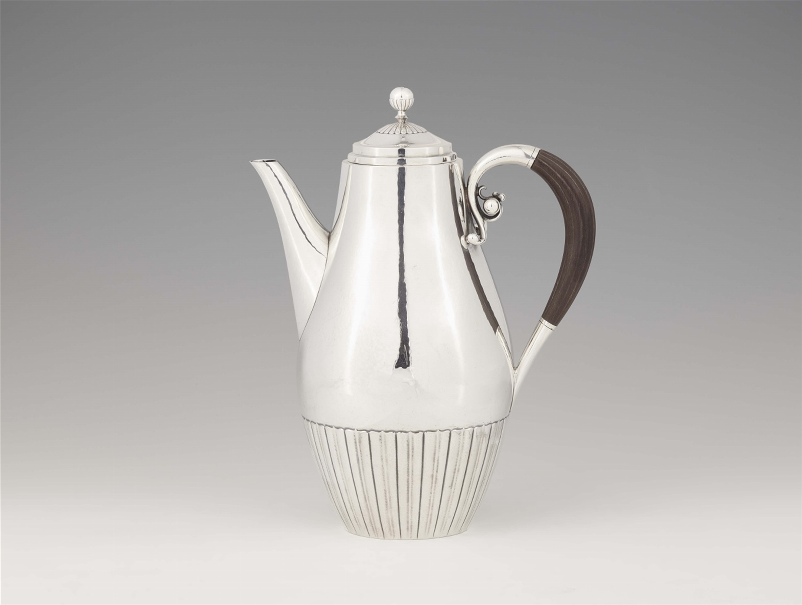 A large Copenhagen silver coffee pot by Georg Jensen, model no. 45