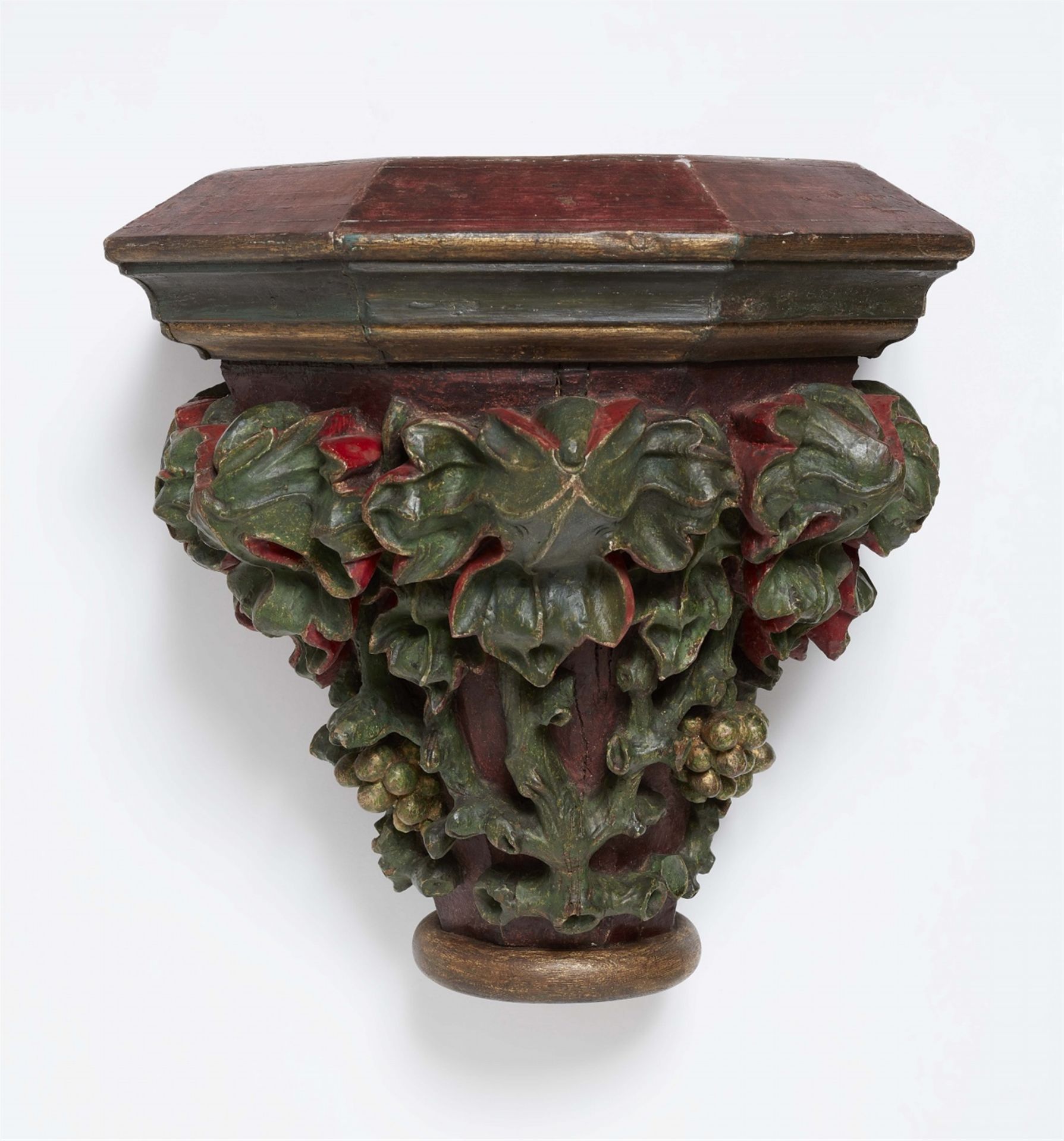 A late Gothic carved oak foliate capital