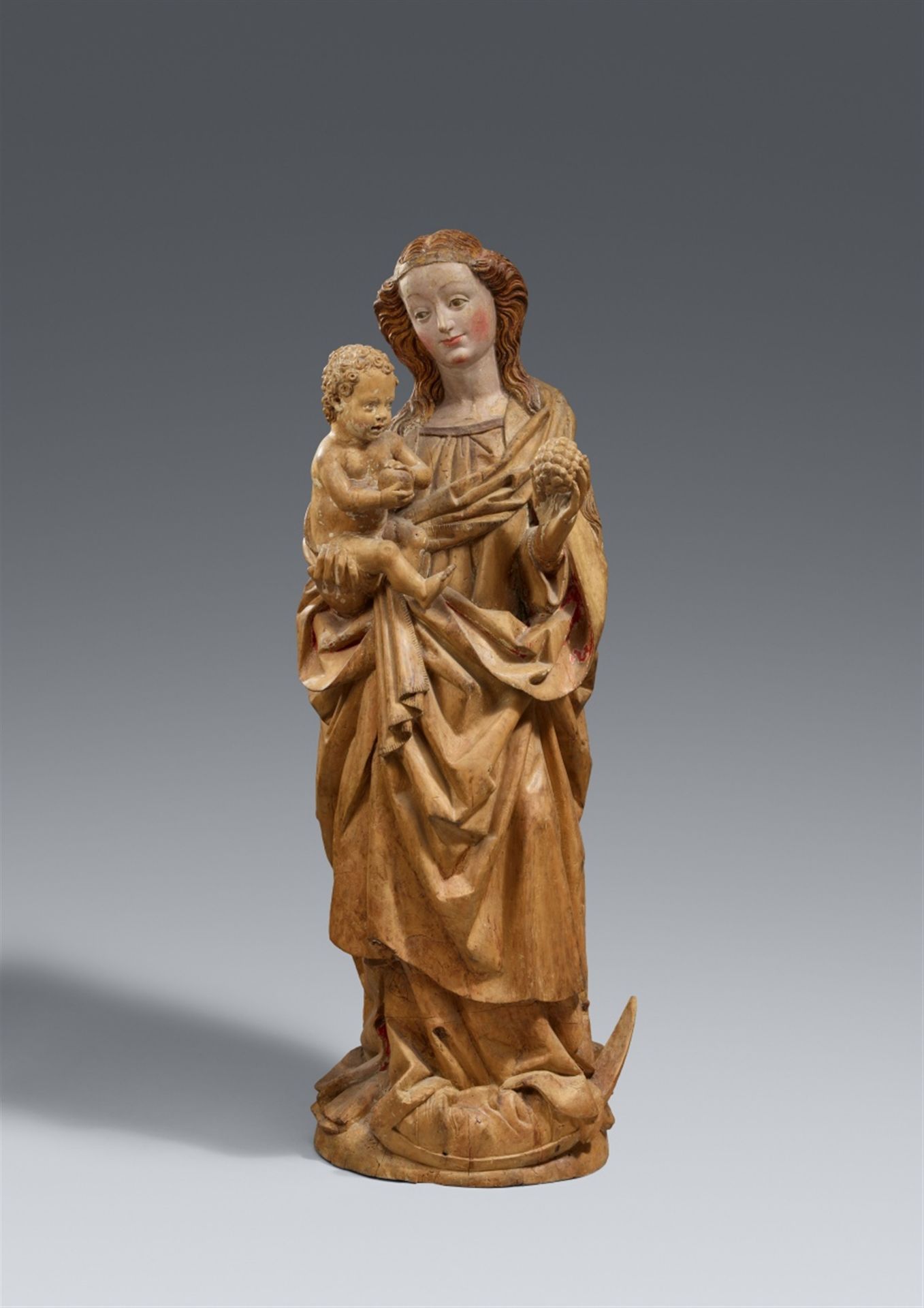 A Franconian carved limewood figure of the Virgin and Child, circa 1470