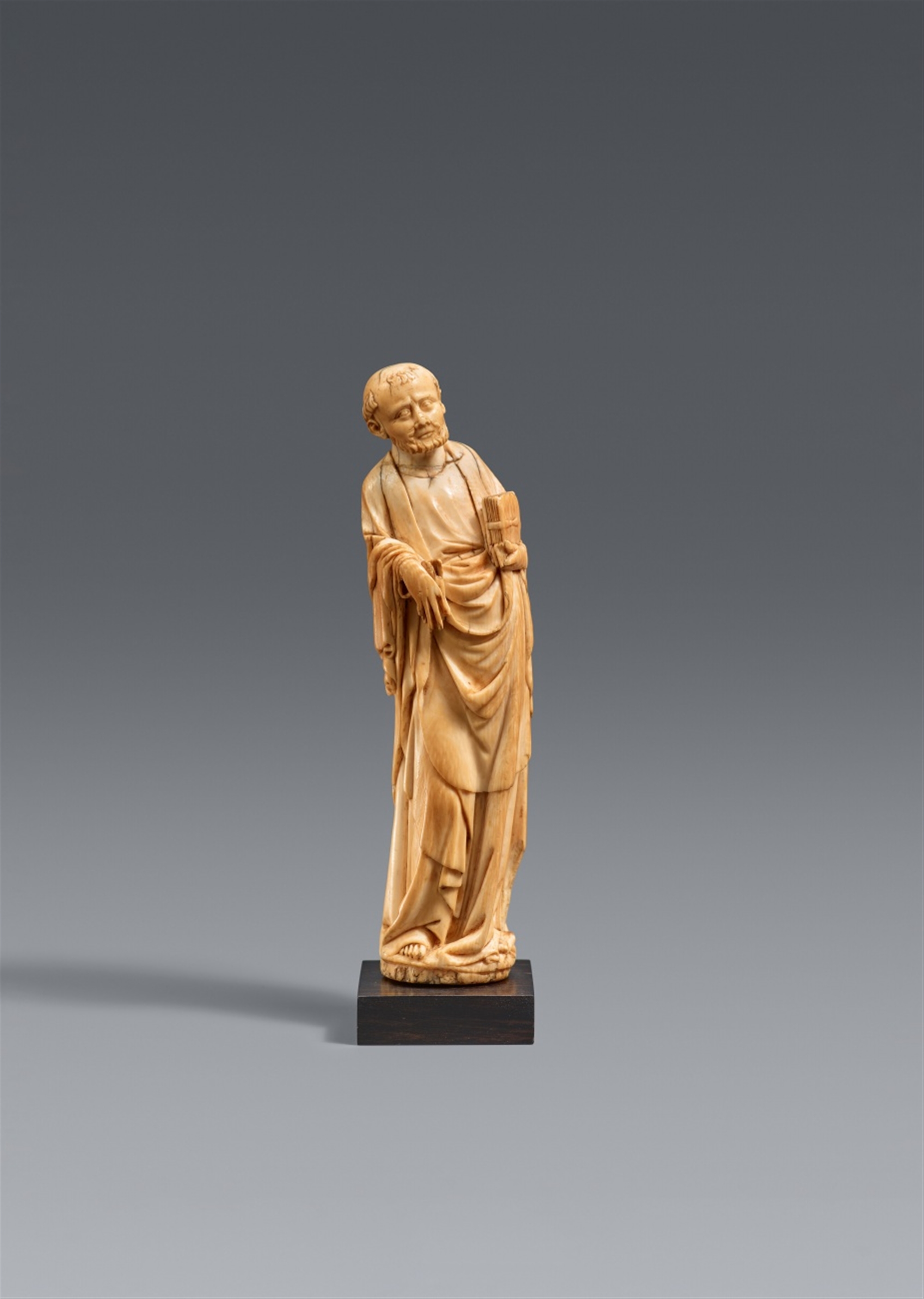 A German carved ivory figure of a monk saint, second half 14th century