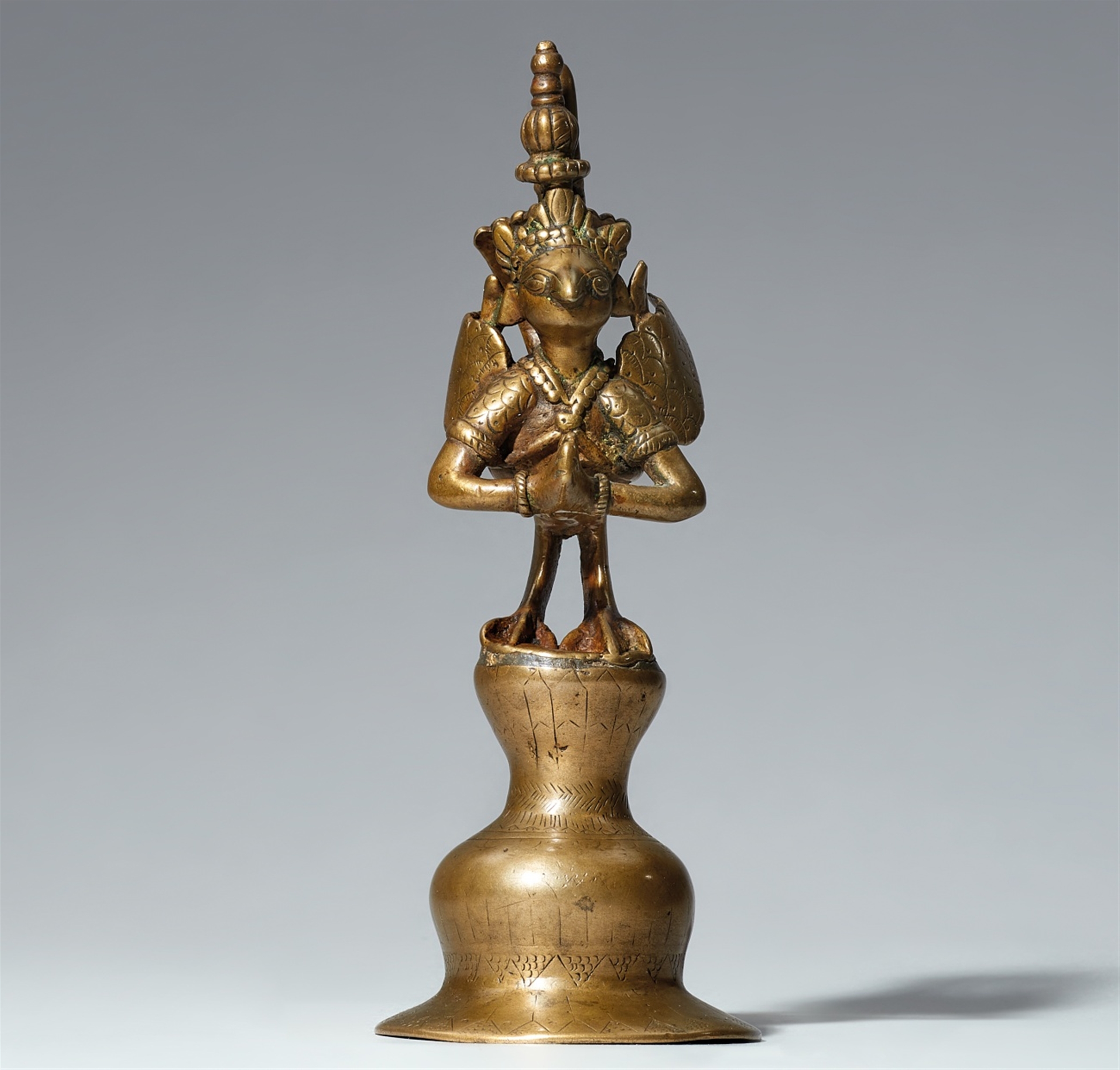 A Deccani brass figure of Garuda. Central India. 18th/19th century