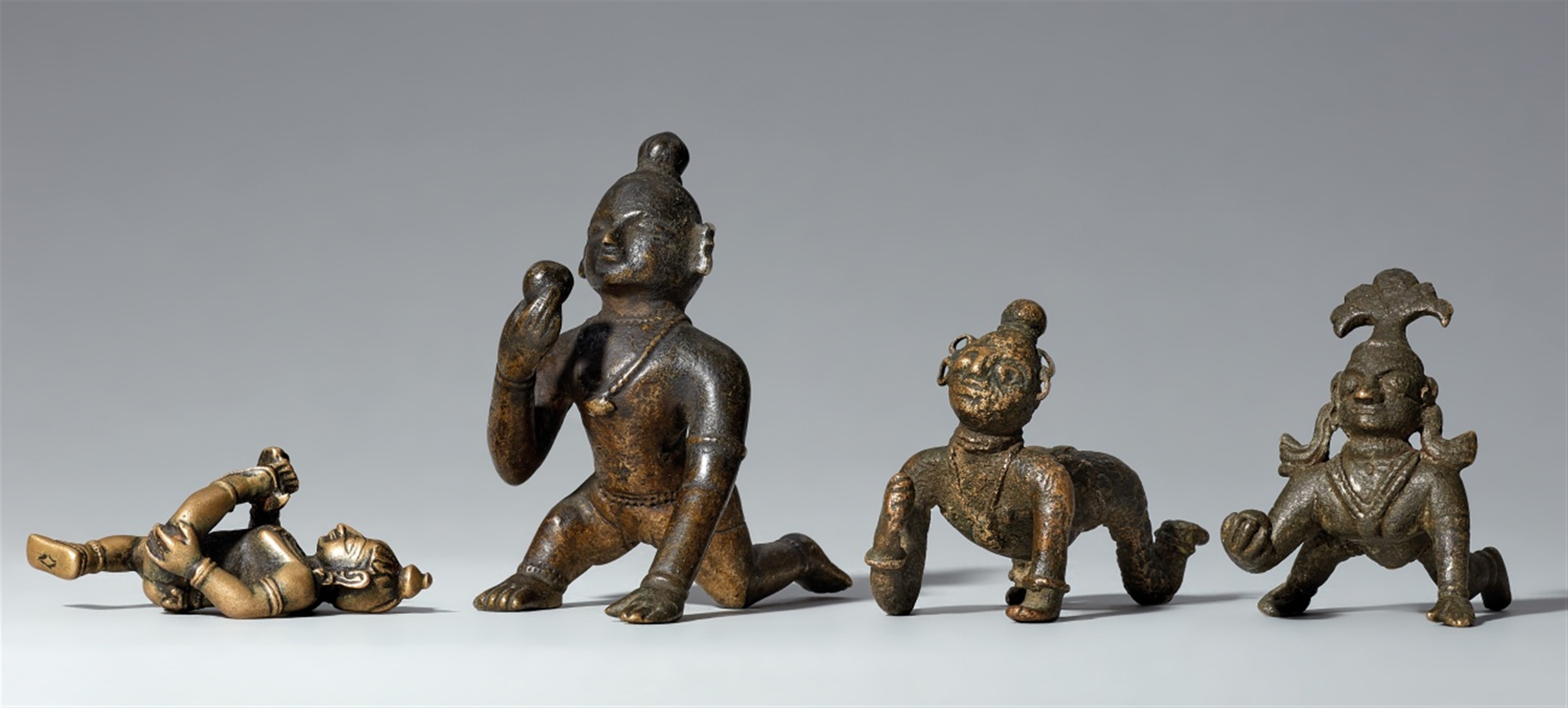 Four Indian copper alloy figures of Balakrishna. 18th/19th century
