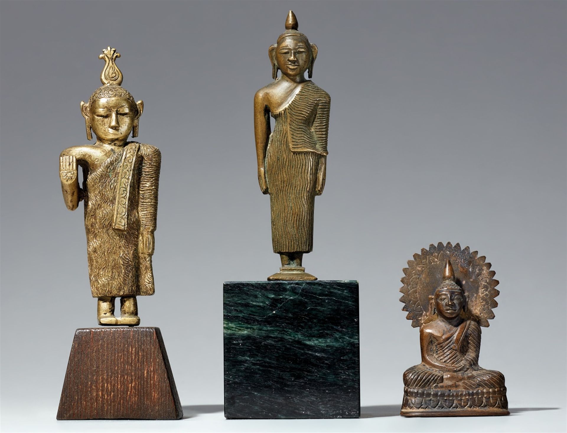 Three small Sri Lankan copper alloy figures of Buddha. 19th/20th century
