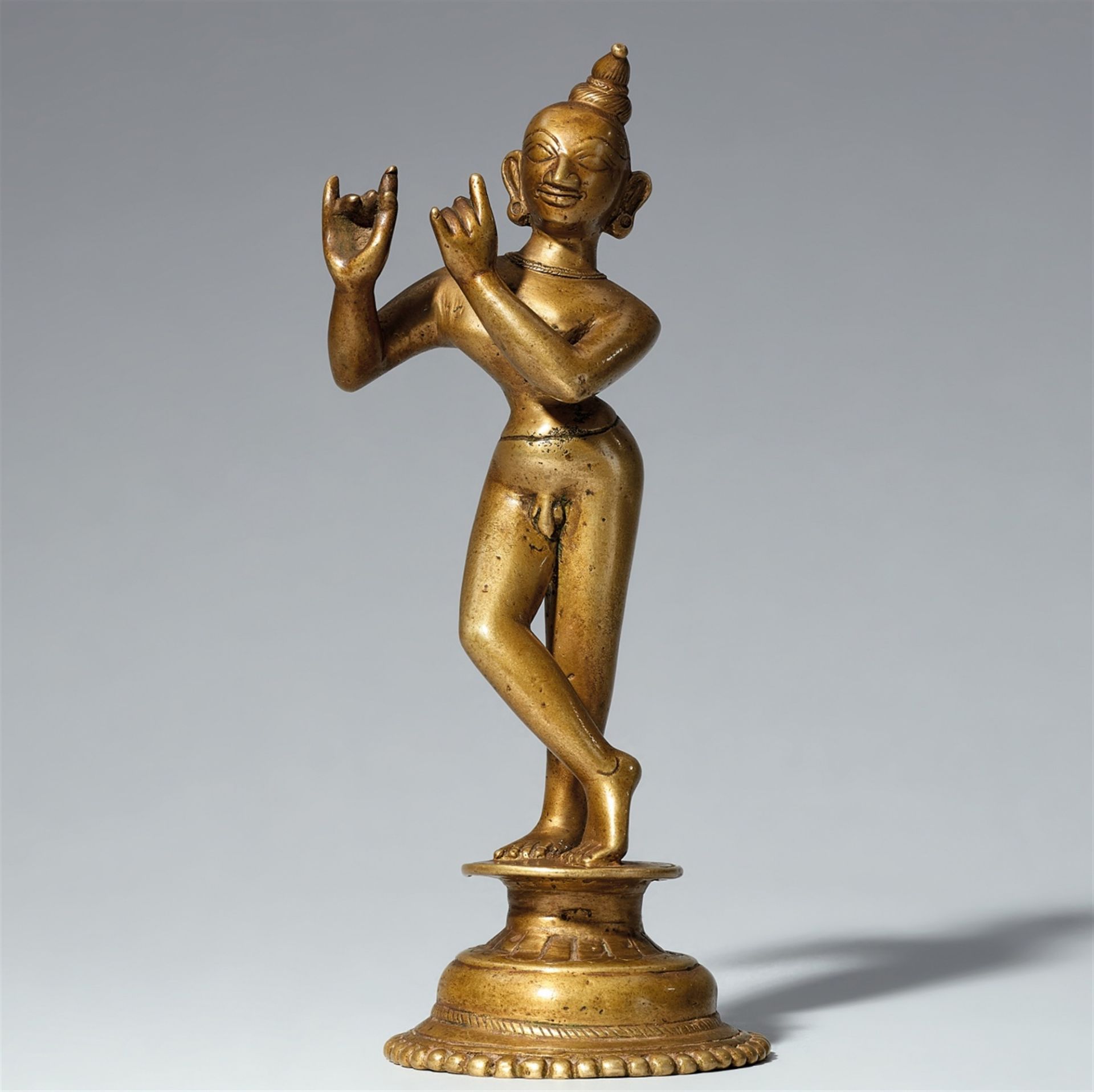 A Bengali or Orissa brass figure of Krishna Venugopala. Eastern India. 18th/19th century
